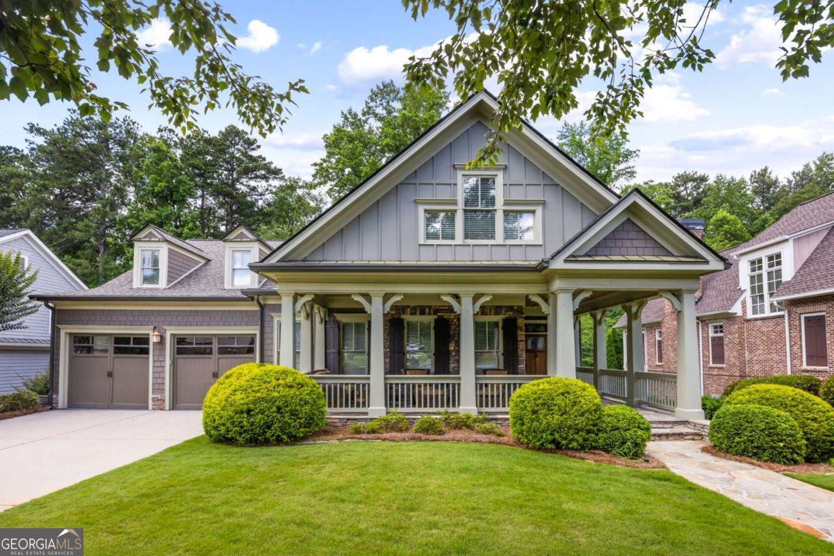 Welcome to 799 Barrett Village Ln NW, a beautifully maintained home in West Side Elementary district that blends timeless craftsman details with modern comfort. Featuring a primary suite on the main level and two additional bedrooms with full baths upstairs, this home offers both convenience and flexibility for today's lifestyle. Step inside to find hardwood floors and custom woodwork throughout, creating warmth and character in every space. The main level boasts a formal dining room, a large family room with fireplace, and a separate den/office perfect for working from home. The chef's kitchen is complete with custom cabinetry, granite countertops, stainless steel appliances, and a spacious breakfast area. A highlight of this home is the full unfinished basement, offering endless possibilities for future expansion, hobbies, or storage. Outdoors, the property truly shines. Enjoy a beautifully landscaped lot with a tranquil Koi pond set against a wooded backdrop. The large screened-in deck provides the perfect setting to sip your morning coffee or host evening gatherings with friends. Practical updates include a newer roof (5 years old) and two new HVAC units installed in 2024, giving you peace of mind for years to come. This home offers the perfect balance of comfort, craftsmanship, and serene outdoor living-all in a desirable Marietta location.