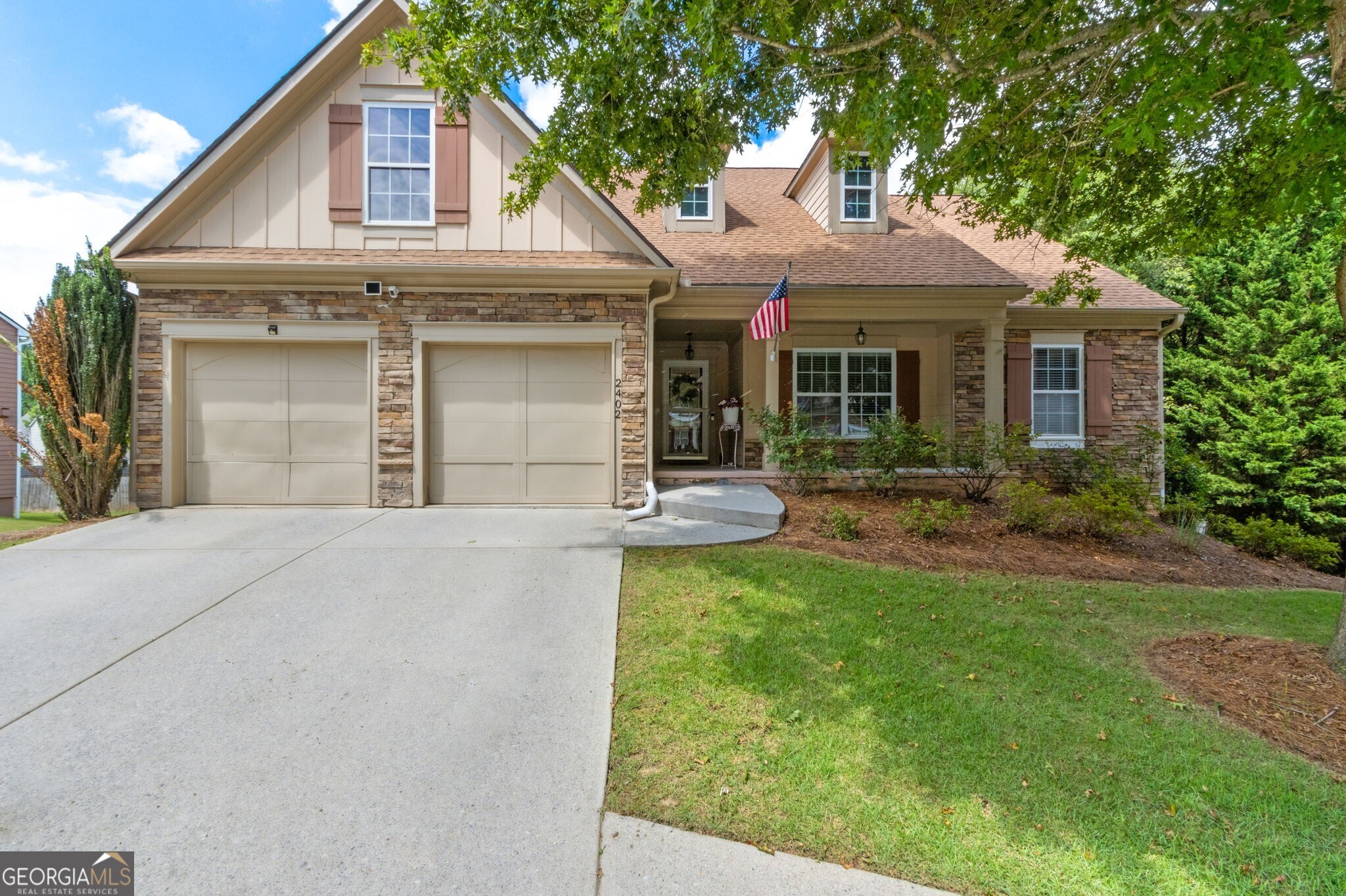 Welcome to this light-filled ranch in award-winning Gwinnett County schools. This 3 bed/2 bath home boasts a new roof and HVAC, hardwood floors throughout the main level, and an open kitchen with newer appliances and vaulted ceilings. The basement offers a ready-to-finish 4th bedroom with plumbing and exterior access perfect for an in-law suite or rental, with no restrictions. Enjoy a private, level backyard and covered patio. Conveniently located near Hwy 985/85, Mall of Georgia, dining, and parks.