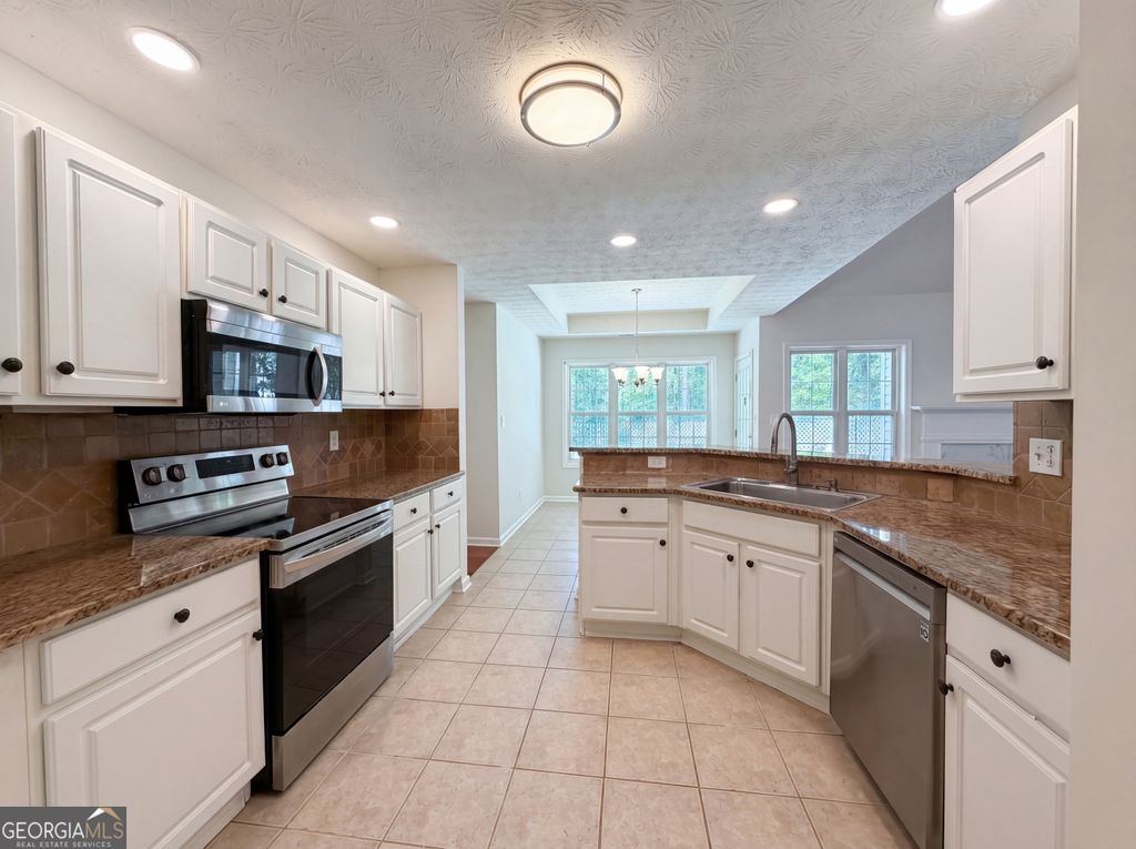 Photo of 335 Hunters Glen, Fayetteville, GA 30215 (MLS # 10735988)