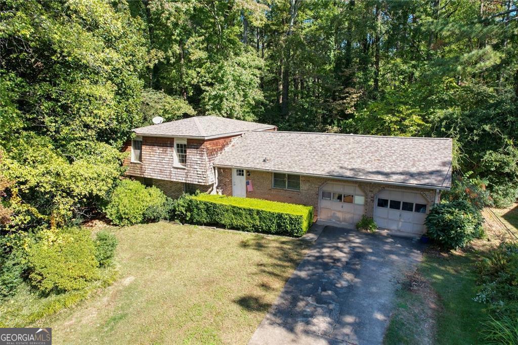 CALLING ALL BUILDERS, INVESTORS, OR SOMEONE LOOKING TO BUILD THEIR DREAM HOME! This is your chance to build in one of the most desirable and rapidly appreciating neighborhoods just outside Downtown Alpharetta. Nestled in the heart of Alpha Park, a nearly acre basement lot offers endless possibilities for a stunning new build. Live just minutes from everything Alpharetta has to offer! Enjoy a 3-minute walk to The Maxwell Co home to RenaCOs Italian Fishery & Grill, Lily Sushi Bar, Fairway Social, and more. Or around the corner to explore the award-winning shops, restaurants, and entertainment of Downtown Alpharetta. Surrounded by new construction homes valued at $2M+, this property is not only a place to live Co itCOs a smart investment. Enjoy the privacy of a residential lot while being right off the AlphaLoop, perfect for walking, biking, and connecting to the vibrant community. With easy access to GA400, top-rated schools, and a dynamic mix of local amenities, this location is the total package. Bring your builder and your vision Co this is the opportunity you've been waiting for! Home sold as-is.