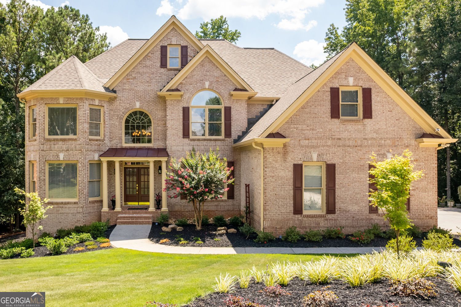 Welcome to 155 Hollymount Rd - A Stunning Retreat in Sought-After Glen Abbey! Tucked away in a quiet cul-de-sac, this beautifully maintained 5-bedroom, 5-bath home offers the perfect blend of elegance, space, and functionality in one of Alpharetta's premier swim/tennis communities. Step inside to a bright, open floorplan with soaring ceilings, abundant natural light, and generous living spaces designed for modern living and entertaining. The gourmet kitchen flows seamlessly into the family room, while each bedroom offers ample closet space and private access to a full bath. A large unfinished basement provides endless potential for customization. Outside, enjoy the privacy of a secluded, landscaped backyard featuring a spacious patio and a tiered fountain, with playground just behind the home - ideal for relaxing or hosting gatherings. A three-car garage adds convenience and additional storage. Just minutes from North Point Mall, Avalon, parks, top-rated schools and major retail and dining options, this location truly can't be beat. Glen Abbey residents enjoy exceptional amenities including multiple tennis courts, a resort-style pool, scenic walking trails, and a peaceful community lake. Don't miss your chance to own this exceptional property in the heart of Alpharetta!