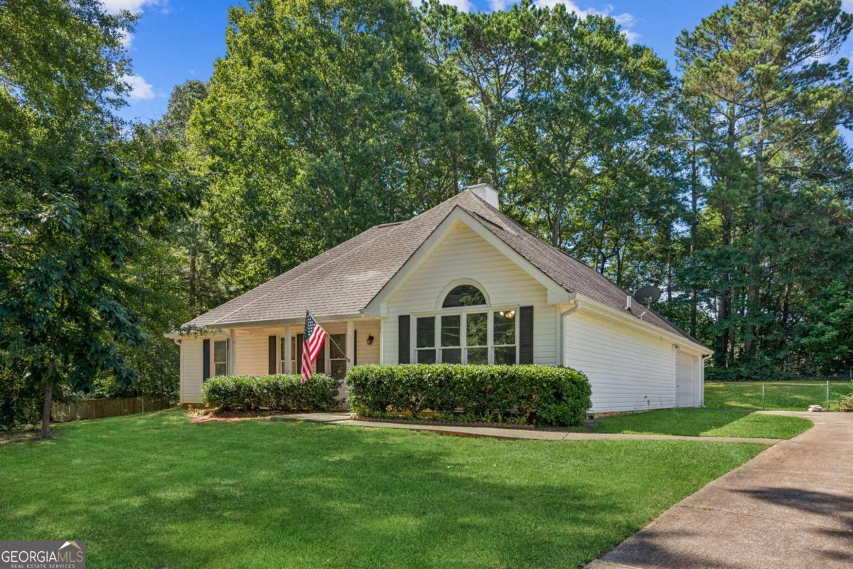 Nestled on a quiet road in Auburn, GA, this ranch-style home offers the perfect mix of comfort, potential, and location. Whether you're a first-time homebuyer ready to build equity or an investor looking for a solid value-add opportunity, this property checks the boxes. With no HOA, friendly neighbors, and a fenced-in backyard ideal for pets, or small gatherings, the setting of this home is peaceful and versatile. Inside, you'll find a one-level layout with durable flooring, a recently replaced water heater, and all major systems currently in working condition, providing a strong foundation for updates. The home could benefit from some improvements, offering an excellent chance to boost value and tailor the space to your needs. The two-car garage, extended driveway, and spacious lot add to its functionality and long-term investment value. Whether you're planning a flip, a buy-and-hold rental, or simply want a place to make your own, this home is priced with your vision in mind and sold as-is. Book your showing today!