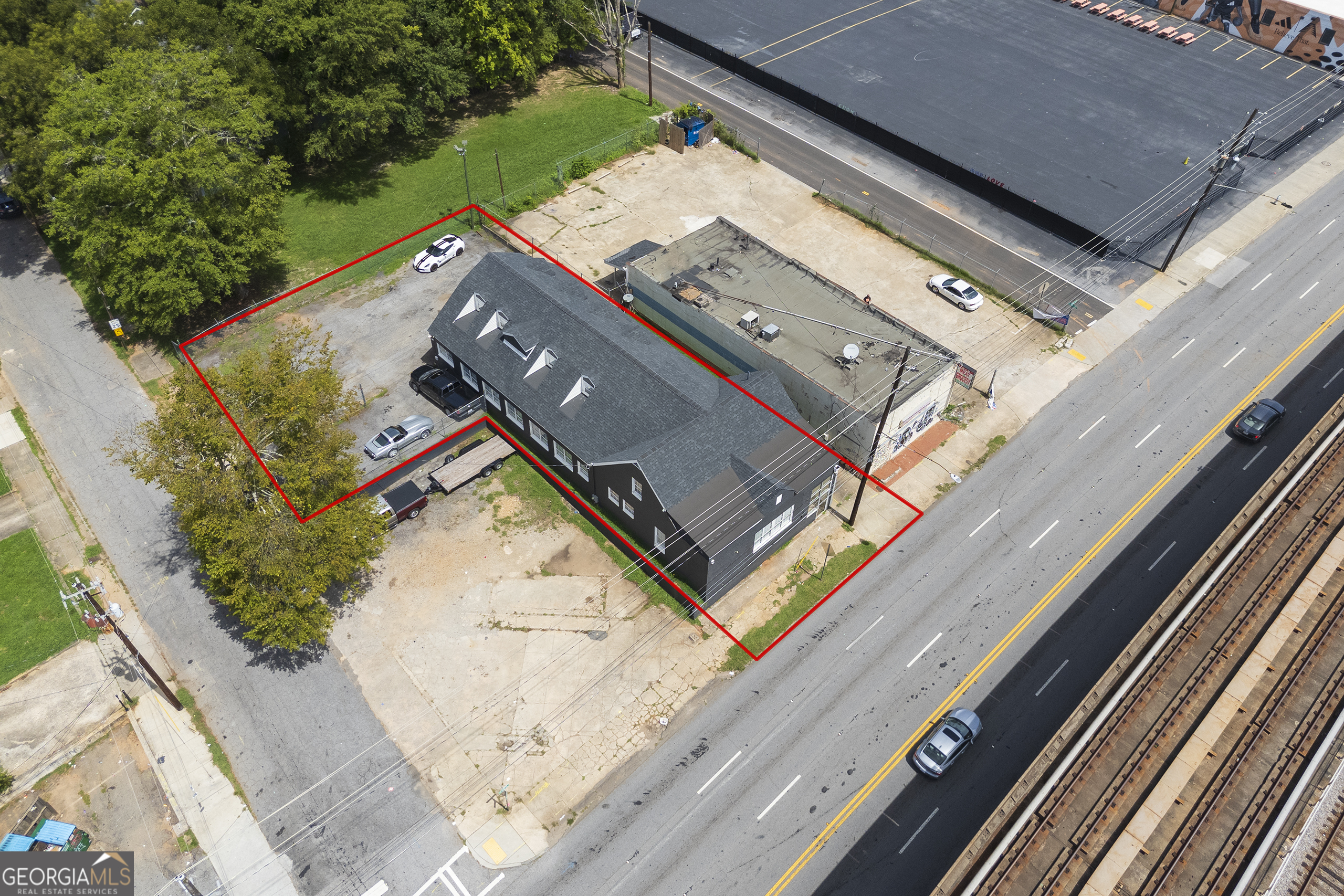 FOR SALE - High-Exposure Corner Lot Commercial Property | 1181 Lee Street SW, Atlanta, GA 30310 Unlock maximum visibility and potential with this prime corner lot commercial property located at 1181 Lee Street SW in the heart of Atlanta's fast-growing Westside. Situated on a signalized intersection with dual street frontage and on-site parking, this high-traffic location is ideal for a wide range of uses including retail, office, restaurant, or mixed-use redevelopment. This site offers unbeatable access and positioning-right off the Atlanta BeltLine, just minutes from Historic West End, and surrounded by some of the city's most exciting growth corridors. Benefit from steady car and foot traffic, excellent MARTA access, and close proximity to Lee+White, Morehouse, Spelman, and the Cornelot Creative Campus. Property Highlights: * Corner lot with maximum visibility and street exposure * On-site private parking - a rare asset in the area * 6000 SF building on a spacious lot with dual access * Zoned for commercial or mixed-use development * Steps from the Atlanta BeltLine, Monday Night Garage, Best End Brewing, and other popular destinations * Located in an Opportunity Zone and near active redevelopment projects * Ideal for owner-occupants, investors, or developers This is a prime opportunity to secure real estate in a rapidly transforming area. Whether you're establishing a new business or developing a future-forward space, 1181 Lee Street SW offers unmatched location, flexibility, and value in one of Atlanta's hottest neighborhoods.