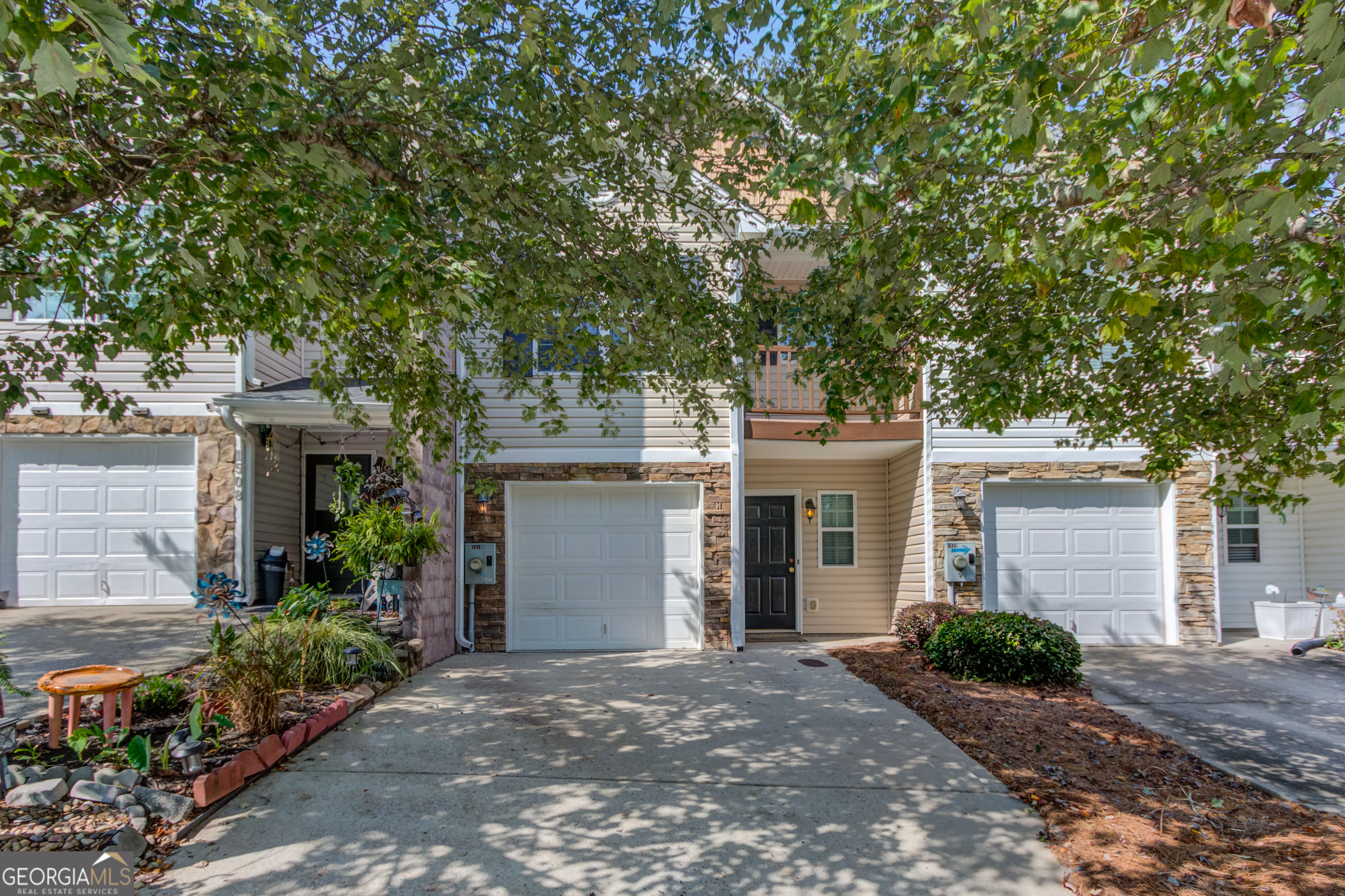 WOW! Fantastic First Time Home Buyer option or investment opportunity! Seller has completed numerous upgrades including new HVAC in 2024, Air duct cleaning, new stainless kitchen appliances, new window blinds and new paint throughout the home! This attractive townhome has been well maintained and features LVP flooring throughout the main living areas including the kitchen and living/dining areas. The stacked stone fireplace adds a warm touch while the open concept living plan allows you to cook and entertain with ease. The updated kitchen is ready to go with new appliances, pantry, plenty of storage and a great breakfast bar for casual meals. Easy access to the back patio makes BBQing or enjoying the cool Fall weather a breeze and backs up to a wooded area providing privacy and an air of peacefulness. A half-bath conveniently rounds out the main level of the home. Upstairs you will find a spacious Primary bedroom with a sitting area and Juliet balcony! The ensuite bathroom offers a relaxing soaking tub, separate shower and great closet for storage! Two additional bedrooms and a full bath as well as a convenience upstairs laundry area provide all the space you need! Turtle Creek Villas offers a lovely pool, tennis courts & a great clubhouse! Near all area amenities this home is ready to go!