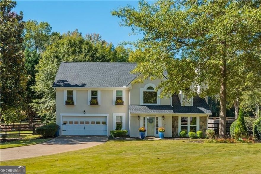 Located on a peaceful cul-de-sac lot, this beautifully renovated 4-bedroom, 2.5-bathroom home boasts an open-concept design and upgrades too numerous to name. The home features a spacious, light-filled living area perfect for entertaining, seamlessly connecting to the gourmet kitchen. Enjoy the serenity of a private, fenced backyard that backs up to a tranquil pond with a fountain, providing the perfect setting for relaxation. Step outside to the screened-in porch or unwind by the fire pit on the charming patio pavers. The expansive yard offers both privacy and the ideal outdoor space for family and friends. Conveniently located near all the vibrant shops and dining options of Downtown Alpharetta, this home offers the perfect balance of modern living and peaceful seclusion. Don't miss the chance to make this exceptional property your own! SHOWINGS START FRIDAY, FEB.14 AT NOON!