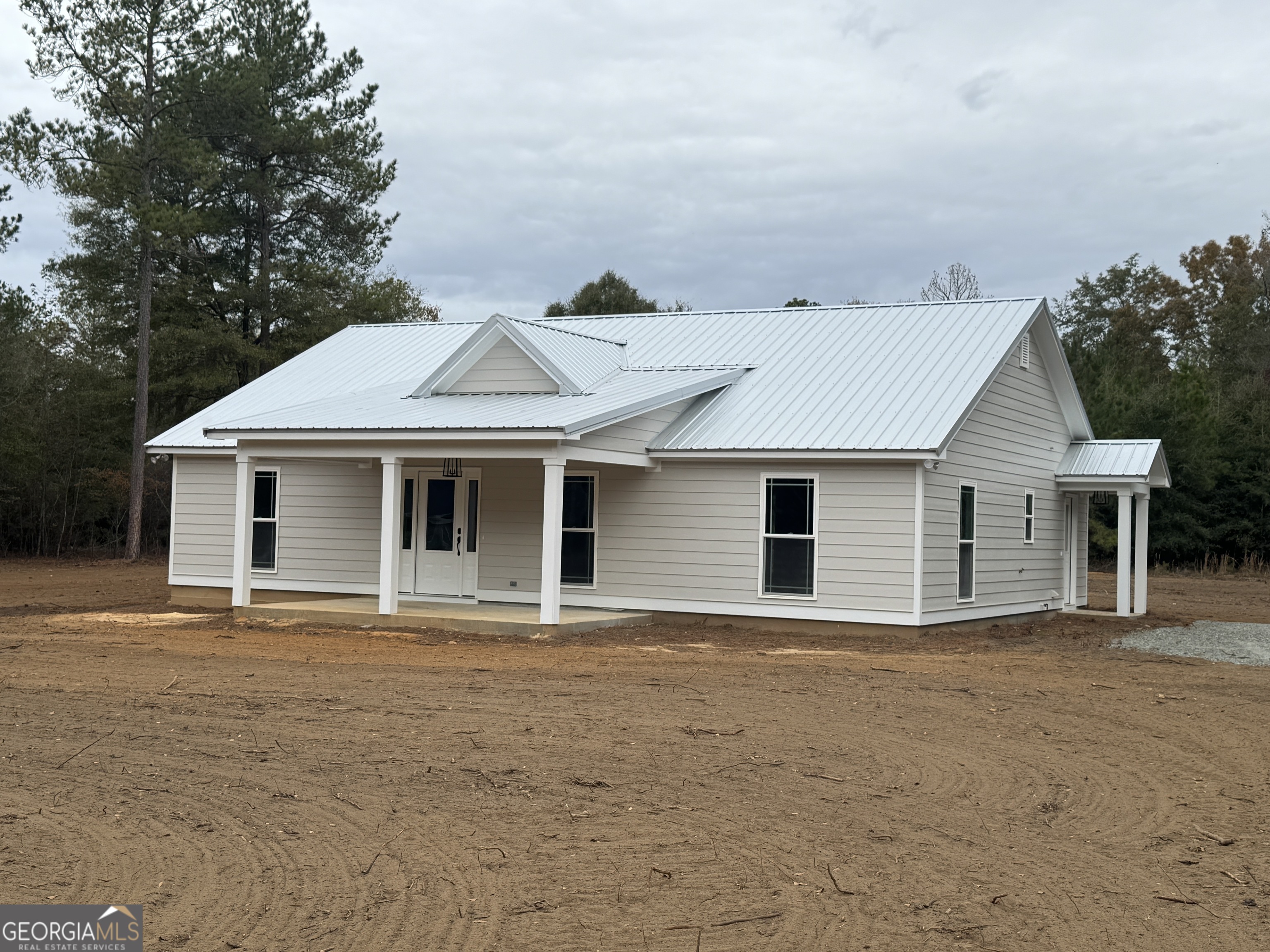 It is Time to Put in Your Contract for this NEAR Complete BRAND NEW CONSTRUCTION in the Lake Blackshear/Flint River Area to be done by 12/30/24! Situated on 1 Acre of Land in the Neighborhood of Yellow Fly Subdivision this apprx. 1755 total sq. ft. home,1575 heated sq. ft. has 3 beds/2 baths. Exterior Planned Paint Color is Light Grey, Durable Vinyl Plank Style Floors, Custom Cabinets, NEW Stainless Steel Appliances, Tiled Master Shower with Double Vanity & More! OPEN Concept Design is Great & pictures show the finished product & paint color within listing. Seeded yard with gravel driveway.
