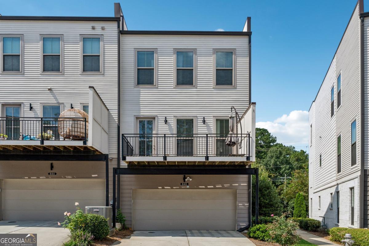 Experience the perfect blend of style and convenience in this beautifully upgraded 3 Bedroom 3.5 Bath townhome in the desirable Towns at North Decatur community! Built in the early phases of the subdivision by a premium builder known for superior craftsmanship and finishes, this residence showcases thoughtful upgrades and timeless design that set it apart. The main level boasts an open-concept layout with a spacious family room, dining area, and chef's kitchen featuring all white cabinetry, granite countertops, and modern fixtures. This main level also has an additional half bath and an upgraded butler's pantry for all your extra kitchen storage and serving needs. Expansive windows throughout the house flood the open spaces with natural light, creating a bright and inviting atmosphere. Upstairs, you'll find two large bedrooms with ensuite baths-essentially dual master suites-providing comfort and flexibility for families, roommates, or guests. The Primary Suite upstairs consists of two spacious his/hers closets, double vanities, and a large glass standing shower. For added convenience, there is a laundry room/closet upstairs so that you don't have to drag your laundry up and down the stairs each time. The lower level offers an additional private bedroom with ensuite bath, perfect for a guest suite, home office, or study. A 2-car garage provides added convenience and storage along with an electric car charging station for modern efficiency and eco-friendly living. Enjoy the outdoors with a large back deck overlooking the community, ideal for entertaining or unwinding. Additionally, there is a fenced-in private front yard, perfect for morning relaxation or spending time in nature. The community features a dog park and extra guest parking, while its unbeatable location is just steps away from Lulah Hills, Decatur's new upcoming multi-million-dollar mixed-use development with shopping, dining, and retail that will further enhance the already thriving North Decatur area. With easy access to Highway 78 and I-285, and just 30 minutes from Hartsfield-Jackson Airport, this home is ideal for both commuters and those who love city living with suburban convenience. Invest in this area today before the new projects and developments substantially increase demand and property values. Don't miss your chance to own this exceptional townhome in one of North Decatur's most sought-after communities! Schedule your private showing today!