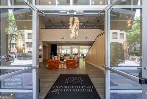 Photo of 711 Cosmopolitan Drive NE #338, Atlanta, GA 30324 (MLS # 10656747)