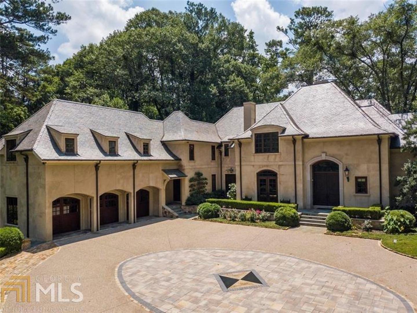 Exceptional estate in Tuxedo Park. 1.45 private acres complete with pool, spa, pool house and koi ponds. The quality and craftsmanship of this property is exceptional. Hardcoat stucco and slate roof. Stone masonry fireplaces in family room and screened in loggia. Spectacular outdoor kitchen next to the waterfalls and koi pond. The grounds and pool designed by LandPlus. Separate pool house with full bath and kitchen perfect for a dedicated office. Spectacular wine cellar, media room. Master, sitting room on main with marble bath, steam and heated floors. Whole house generator, well, mosquito sprayers and Crestron smart home. This is a must see property in Tuxedo Park.
