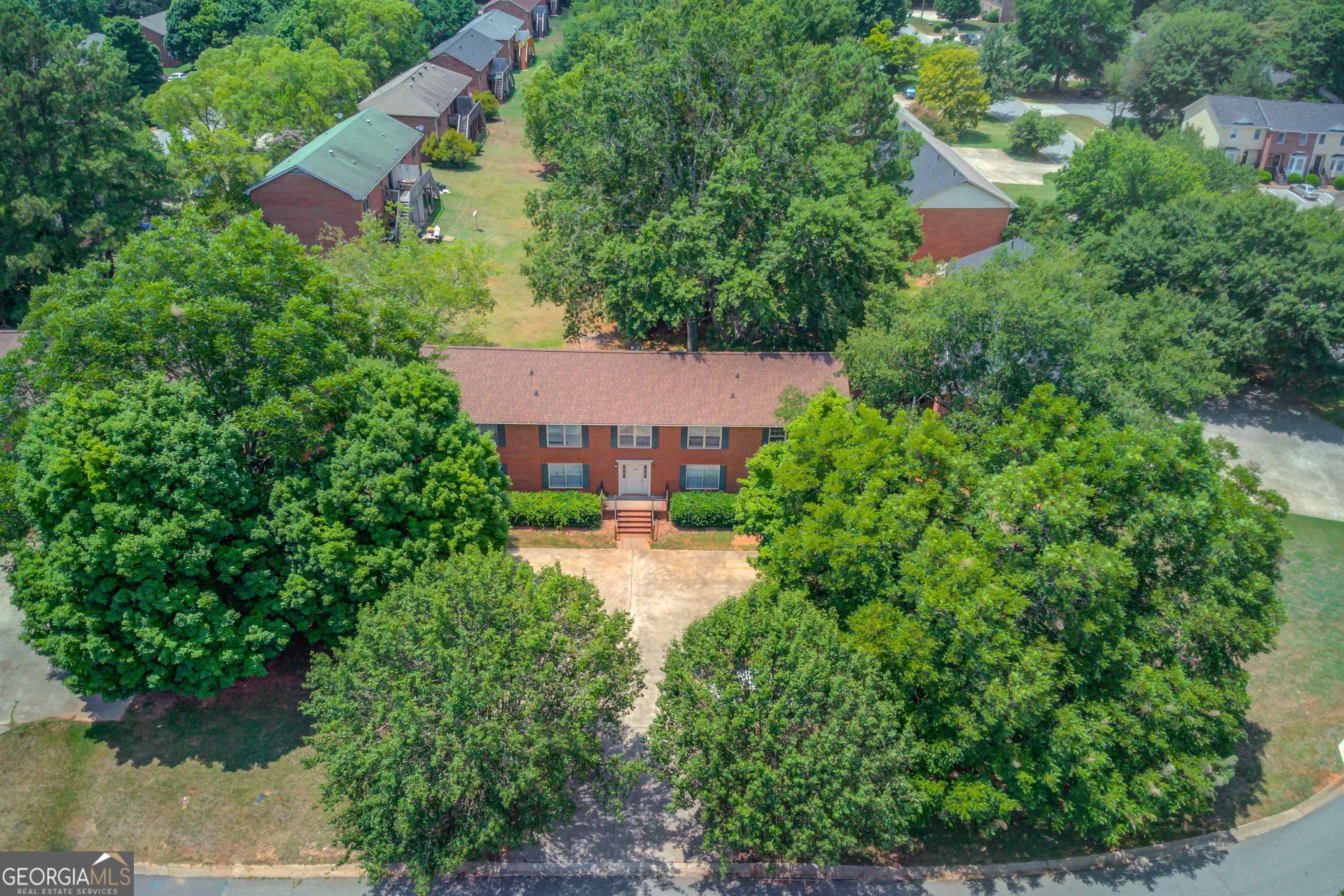 Check out this meticulously maintained condo UNIT 3 that was recently updated! Updates include laminate and tile flooring throughout, paint throughout, Located on the 2nd floor. Front door opens up to the living room for entertaining friends. Big eat in kitchen with doors leading out to your own private patio! Bring your grill and patio chairs. Need a break from the sun? Roll out your attached awning cover for some shade. Slightly wooded yard for some privacy. Back inside, is the oversized master bedroom and large secondary bedroom. Both have their own walk-in closet and private bath! Perfect for a UGA student and room mate, Walking distance to shopping and dining. Within minutes of UGA. Hurry and move in for the new school year! Refrigerator, washer and dryer included!