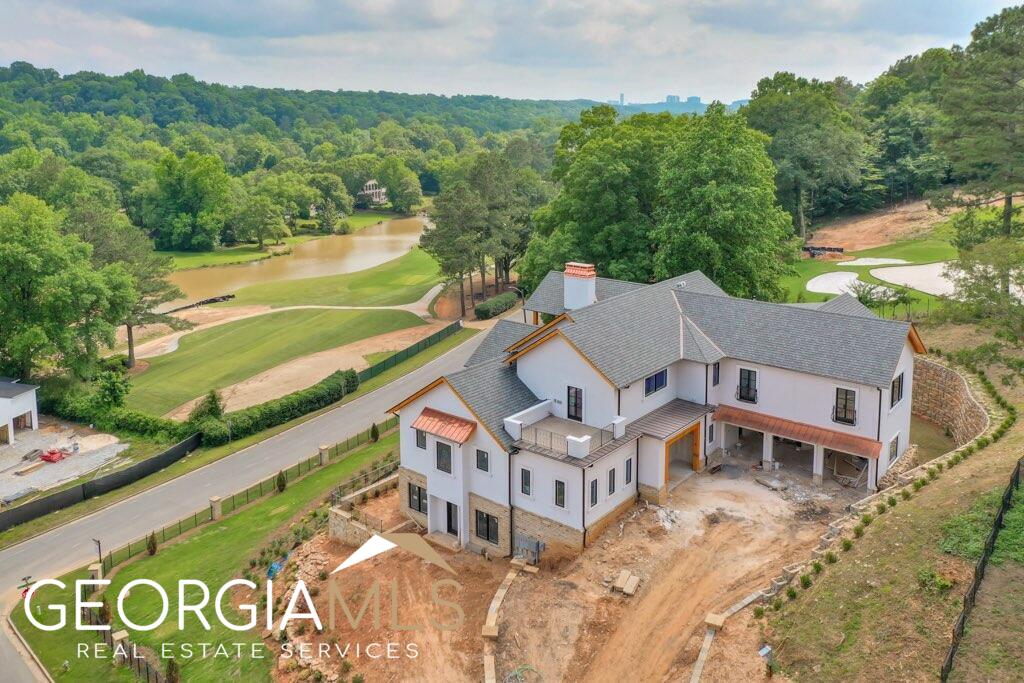LOCATION! Stunning NEW Build in Atlanta Country Club on the course- low Cobb County taxes and top ranked school district. Top quality craftsmanship and building products. Incredible views of hole #3 and #4 green the golf course as well as the Chattahoochee River. Space for an elevator. Floor plan linked. Flat fenced backyard and plenty of space for pool. Whole house water purification system. Get in early to pick out final finishes. Great access to Columns Drive for intown commutes or to enjoy the river park trail.