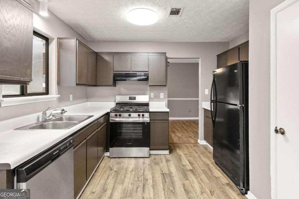 Photo of 5328 Biffle Down Road, Stone Mountain, GA 30088 (MLS # 10707652)