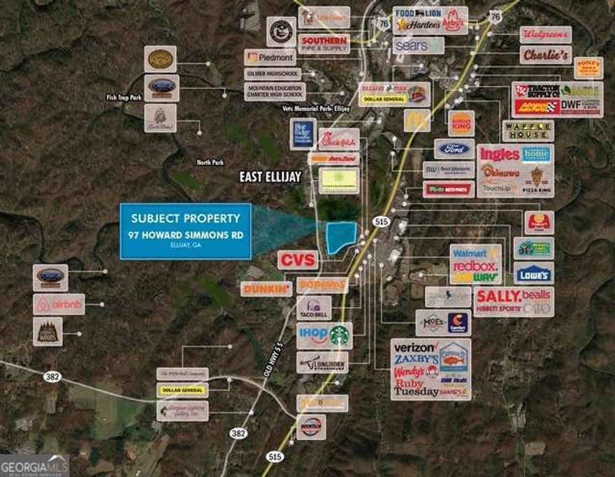 Prime Acreage in the heart of Ellijay/East Ellijay growth corridor. 28.74 acres across from Chick Filet, Piedmont ER,Aldi's and Gilmer Fire Station. Lots of possibilities. County water and sewer available. Partially cleared with some level  pads in place. Additional pads available with additional grading. High visibility for future development.
