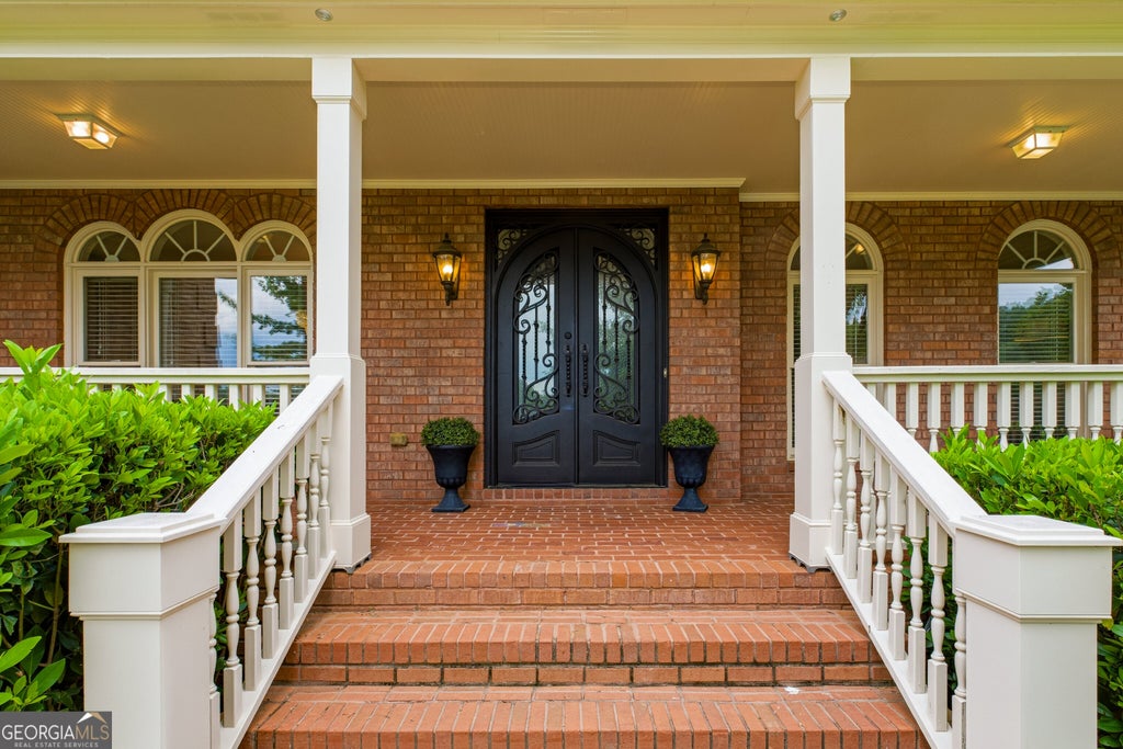 Photo of 1171 Hiddenbrook Lane, Suwanee, GA 30024 (MLS # 10781129)