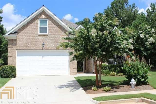 WOW!!! Four sided Brick RANCH in desirable Dacula Neighborhood. Very private and at the end of a quiet street. The home offers Master on the main with Spa Suite, Great Room with fireplace, Eat in Kitchen, separate Formal Dining and two additional bedrooms. Upstairs Bonus for storage, office or 4 bedroom. Newly installed Lifetime Roof, Fenced in Private Backyard, Granite, Hardwood Floors and Surround Sound (wired) are just a few of the upgrades offered in this home. HOA Dues cover the Lawn Cutting and Maintenance of the yard.