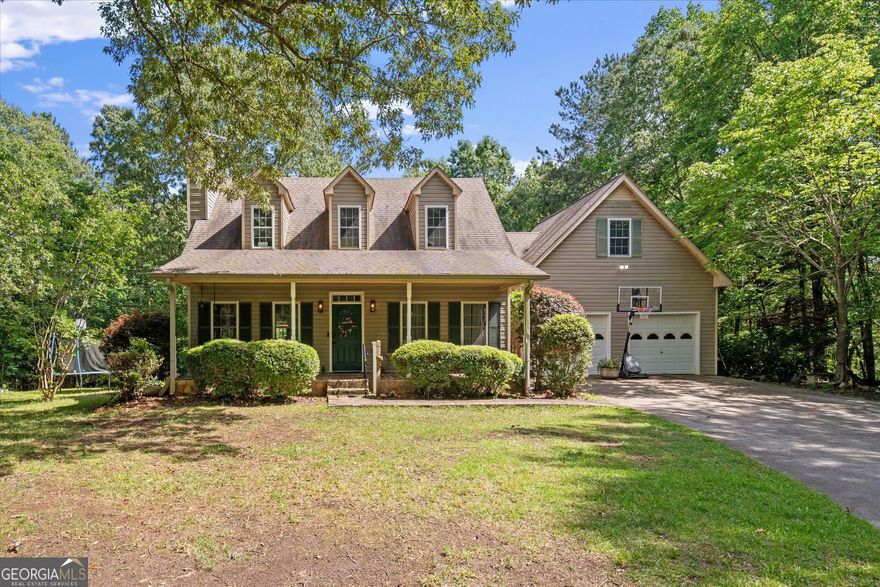 Welcome home to this beautiful home sitting at the end of a long driveway on 5 private acres! Home has 3 bedrooms and an oversized bonus room, two full baths, and an updated powder room. Large living room with fireplace and kitchen that opens to the dining space. Primary suite on main, large walk in bathroom, double vanity, stand up shower and soaking tub. Upstairs features two large secondary bedrooms and shared full bath. The covered front porch overlooks the peaceful yard, and the open back yard has storage building and chicken coop. Minutes from the interstate, but still tucked away!