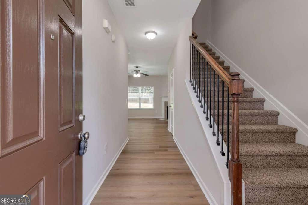 Photo of 1599 Swamp Cabbage Drive, Lawrenceville, GA 30045 (MLS # 10802706)