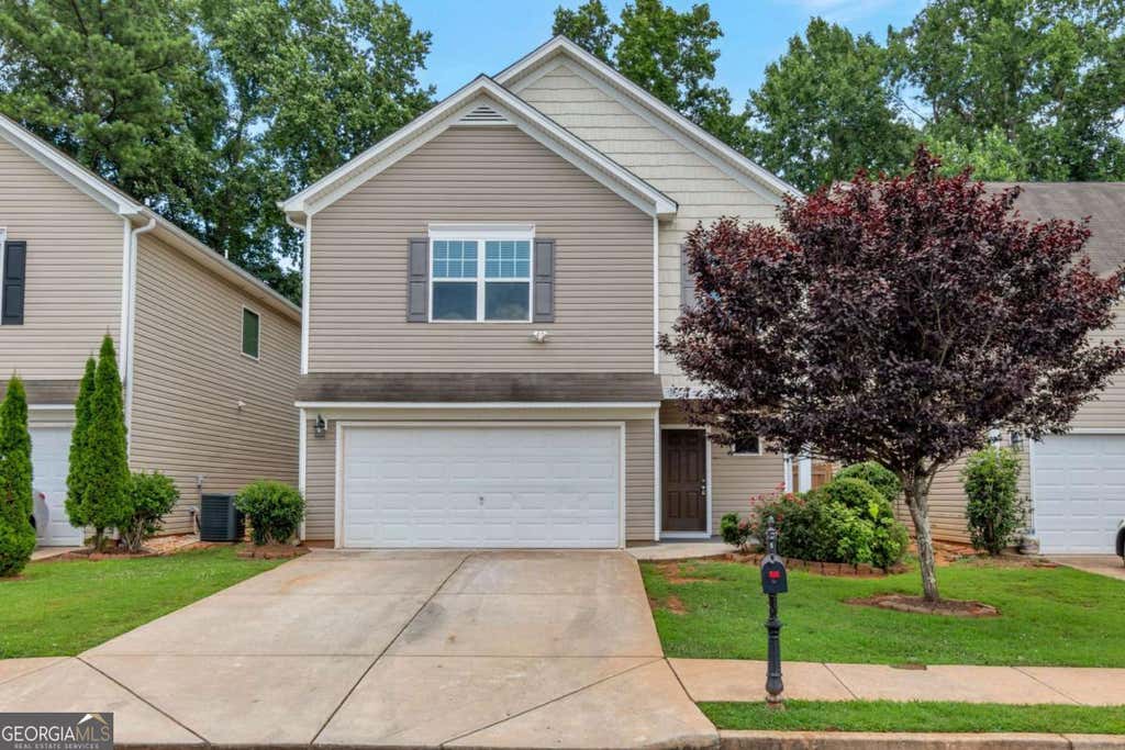 Photo of 1599 Swamp Cabbage Drive, Lawrenceville, GA 30045 (MLS # 10802706)