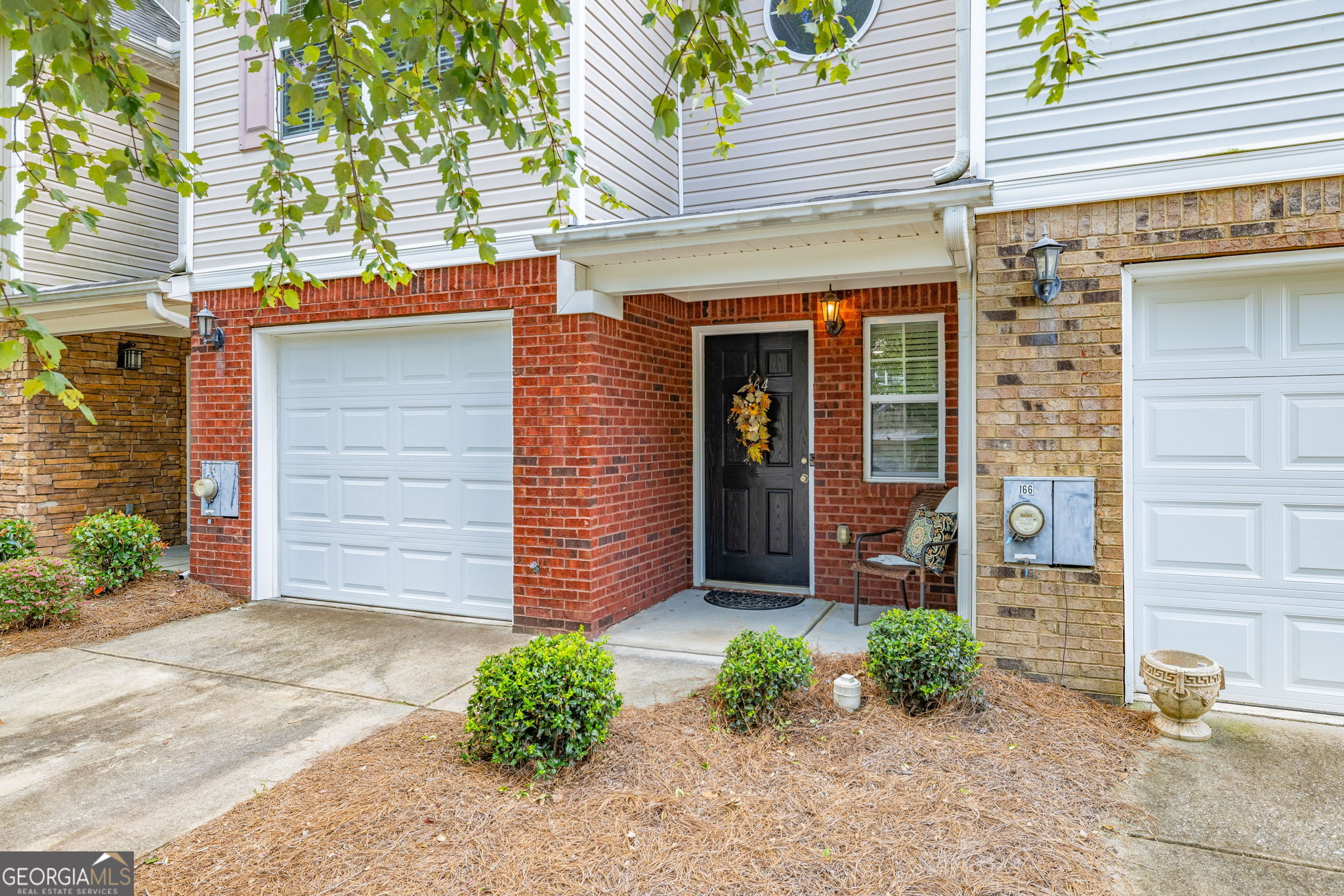 A charming townhome awaits its new owner who desires convenient living. The home is nestled in the tranquil Turtle Creek Villas community and offers mature front yard trees. The location is sought after by having quick access from the community entrance to your driveway and a short walk to the mailbox, bus stop, pool/tennis, and community center. Enjoy flexible living while enjoying HOA maintained yard maintenance, pool/tennis, clubhouse, sidewalks w/ streetlights. The well-maintained move-in ready home makes entertaining friends/family seamless with the main level hosting a comfortable layout, lots of natural light, high ceilings, a half bath with granite countertop, airy eat in kitchen providing granite countertops, SS appliances, pantry, and island with a family room view. Enjoy those cooler evenings with the cozy corner gas fireplace. Additional entertaining seating, grill, and fresh air can be utilized with the exterior patio. Rest and relax upstairs in the primary suite with a walk-in closet and find a bath with granite countertops, and a separate shower/garden tub. A secondary room and closet offers comfort for family and hospitality for guest or would make a wonderful home office. Laundry is conveniently located in the upstairs hallway along with another full bath which also sports a granite countertop. New flooring and interior paint were completed a short 3 1/2 years ago. A lifestyle of convenience is found in this prime location near walking trails, Fort Yargo State Park being across the street, close to Hwy. 316, and excellent choices of restaurants, shopping, Dr. offices, and Urgent Care Centers. This home offers so much for single adults, small families, empty nesters, and busy professionals while providing time for fellowship and fun!