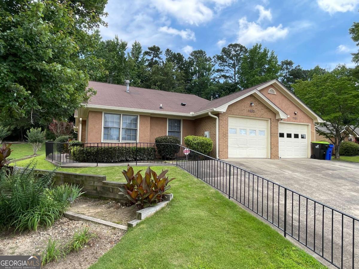 Beautifully updated 2BR/2BA townhome located in The Woods at Christian City, a peaceful 55+ adult community. Updated with new plank flooring and carpet throughout and new paint inside and out. Home features vaulted ceilings in the super spacious living room, large primary bedroom including a walk-in closet. The primary bath features two vanities, Jacuzzi tub and a separate water closet with a shower. Private rear patio provides access to the back yard. Enjoy worry free living in this community with an active HOA which includes landscaping and exterior maintenance. This one won't last!