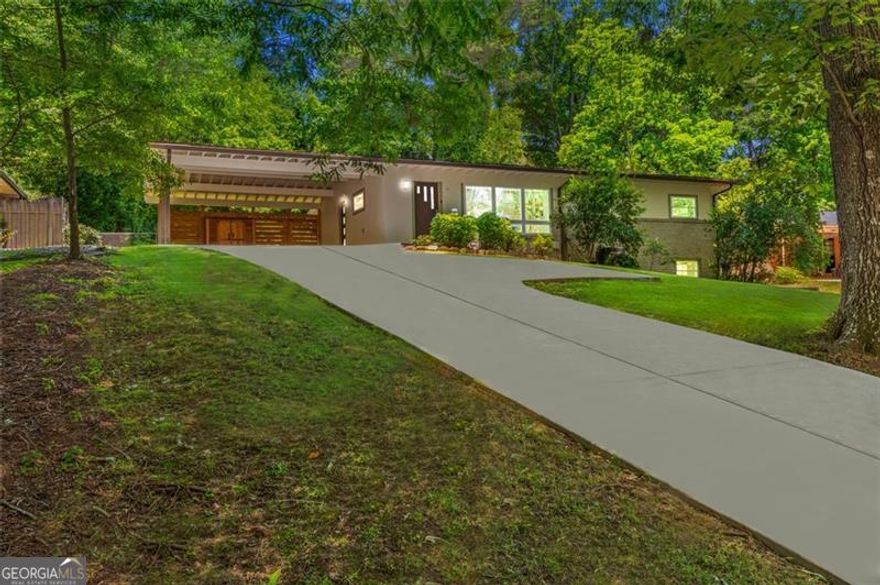 Nestled in the heart of Stone Mountain, Georgia, this unique 1950's MCM ranch style home offers a tranquil retreat from the hustle and bustle of everyday life. The minimalist design, with its clean lines and neutral color palette, creates a serene atmosphere that is both inviting and calming. The Scandinavian influence is evident in every corner, adding a touch of modernity to the classic Mid Century Modern aesthetic. Venture downstairs to the finished basement, a versatile space waiting to be transformed into your personal sanctuary. Includes a whole home  water filter dechlorinator, RO water filtration, & softener. Whether you dream of a cozy entertainment area, a home office bathed in natural light, or a peaceful retreat for relaxation, the possibilities are endless. Let your creativity soar as you envision the perfect space to suit your lifestyle and preferences. Outside, the enchantment continues in the sprawling .40-acre lot that surrounds the property. The terraced backyard beckons you to unwind in nature's embrace, offering a private oasis where you can host gatherings, soak up the sun, or simply revel in the beauty of the outdoors. Elevated above the street, the home provides a sense of seclusion and tranquility, creating a peaceful haven that feels like a world of its own. Conveniently located near the Path bike trail, this residence offers easy access to a wealth of attractions, from the majestic beauty of Stone Mountain to the vibrant energy of downtown Atlanta. Whether you're a nature lover, a culture enthusiast, or a city dweller at heart, this prime location caters to all, making it the ideal place to call home. Don't miss the opportunity to make this Mid Century Modern gem your own. Schedule your showing today and step into a world where timeless elegance meets contemporary flair. Welcome to your new sanctuary in Stone Mountain.