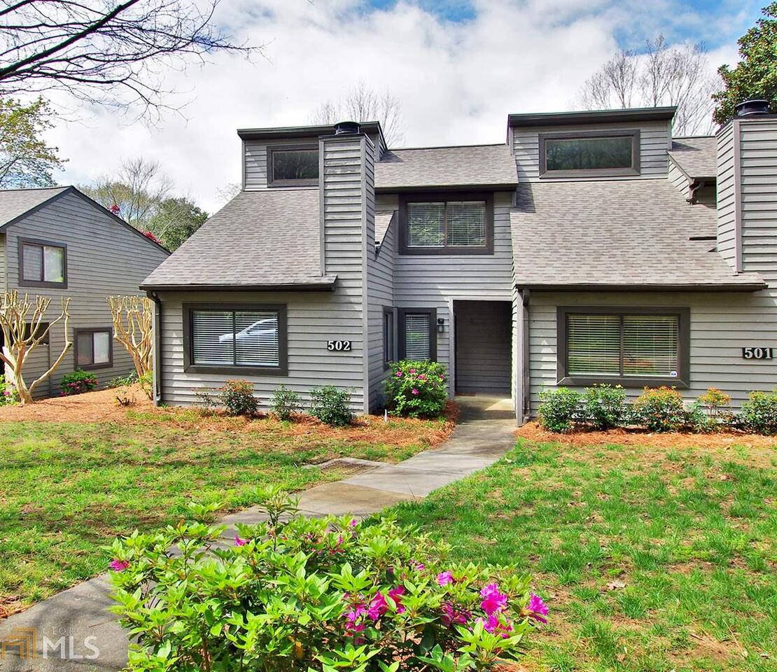 Spacious & renovated 2 Bedroom / 2.5 bath townhome in awesome neighborhood, close to everything. Home features sep liv rm w/fireplace & vaulted ceilings, sep din rm, eat-in kitchen w/stainless appliances & granite counters. Half bath & full size laundry on main level. Master suite w/private bath to include dbl vanity, lg shower & his/hers closets. Additional bedroom & bath on upper level. Pool in community, 2 assigned parking spaces, storage, rear courtyard for entertaining & grilling. Hardwood & tiled floors. Awesome nature trail behind property. This is a must see!
