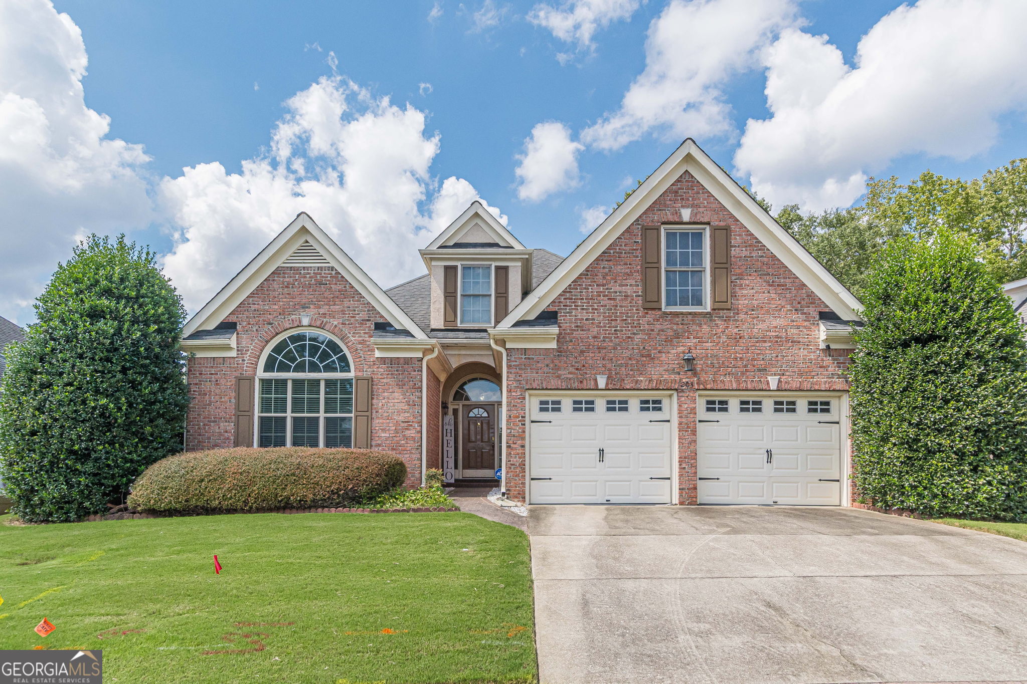 Welcome to this beautifully maintained 4-bedroom, 3-bathroom residence located in the desirable gated community of The Villages of Eagles Landing. Featuring four-sided brick, this home offers timeless appeal and lasting quality. The main level includes a spacious primary suite with a large walk-in closet, double vanity, separate shower, and soaking tub-plus an additional bedroom perfect for guests or an office. Upstairs, you'll find two additional bedrooms and a versatile loft space, ideal for a playroom, home office, or cozy retreat. Step outside to your private backyard, a perfect setting for relaxation or entertaining. The community also offers access to the neighborhood pool. Conveniently located near top-rated schools, shopping, and popular restaurants, this could be your next home!