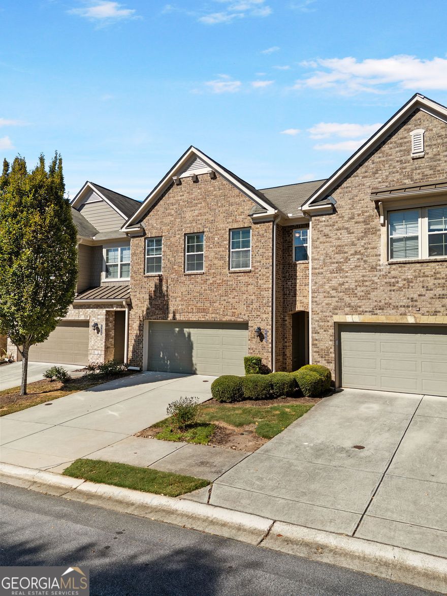 Welcome to this stunning two-story townhome, perfectly situated in one of Brookhaven's most sought-after gated communities featuring resort-style amenities including a sparkling pool and dog park. Just minutes from Dresden Drive's popular shops and dining, major highways, Buckhead, Emory, and CHOA, this home offers the ideal blend of convenience, luxury, and lifestyle.  Step inside to an elegant open floor plan filled with natural light, highlighted by hardwood floors throughout the main level. The chef's kitchen overlooks the spacious living and dining area and features espresso cabinetry, granite countertops, stainless steel appliances, a large island/breakfast bar, and an eat-in kitchen space-perfect for entertaining. The expansive living room with fireplace flows seamlessly to a private patio overlooking a serene wooded backdrop.  Upstairs, you'll find an oversized primary suite with tray ceilings, a generous CUSTOM walk-in closet, and a spa-like bath with a soaking tub and separate tiled shower. Two additional secondary bedrooms share a well-appointed full bath. A large loft area-ideal for a home office, media room, or sitting lounge. The upper level also includes a convenient laundry room with built-in cabinetry. The HOA provides a worry-free lifestyle by covering lawn care, termite protection, and exterior home maintenance. Outdoor enthusiasts will love the easy access to the newly developed Peachtree Creek Greenway, with future community connectivity planned.  Move-in ready and impeccably maintained-this Brookhaven gem is the perfect place to call HOME!