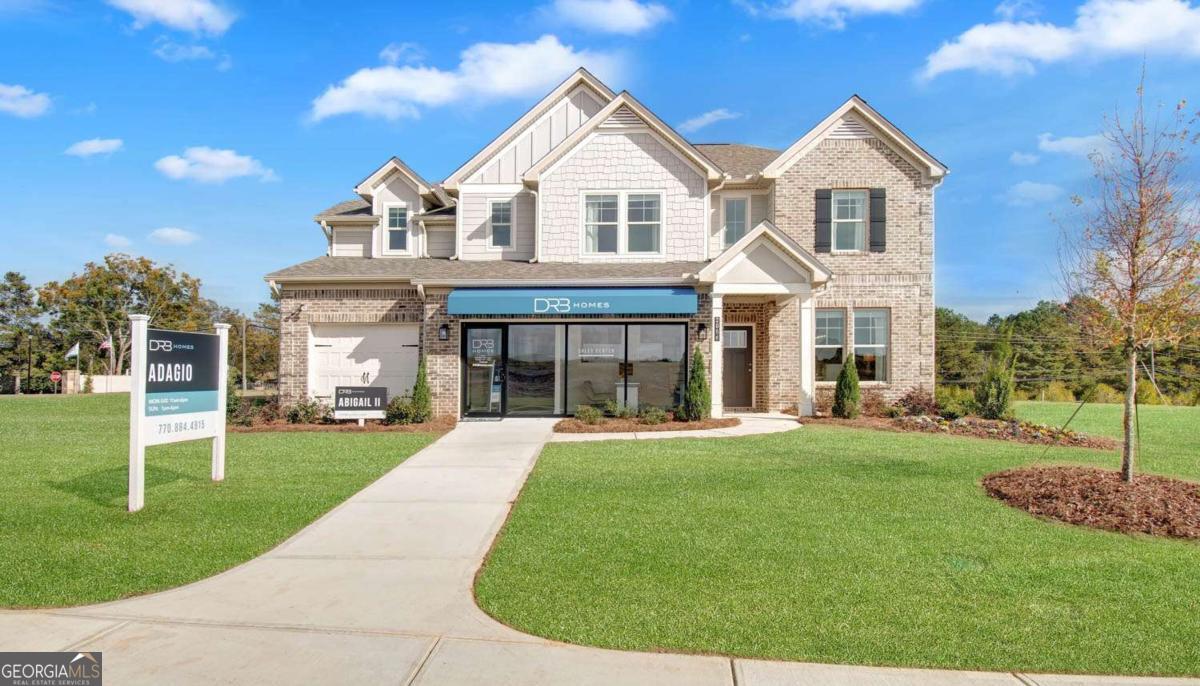 Welcome home to the Adagio community in sought-after Dacula, developed by DRB Homes! Adagio is a new collection of single-family homes featuring timeless 4-Side Brick homes. Lot 2 showcases the spacious Abigail II plan, offering 5 bedrooms and 3 baths, including a tucked-away bedroom on the main level for added privacy. This home is designed with an open floor plan and plenty of options to suit your lifestyle. The stunning kitchen is a dream come true, featuring an expansive island with quartz countertops, a separate built-in desk, double ovens, and a vent hood above the cooktop. Beautiful 42" cabinets and a spacious walk-in pantry complete this chef-inspired space, perfect for entertaining and family gatherings. Upstairs, you'll find a large primary suite, a true retreat with volume ceilings, high level quartz countertops in bathrooms and kitchen, dual vanities, his-and-hers walk-in closets, a tiled shower, and a separate soaking tub. This home also offers flexible living space, including a bright, versatile room that can serve as a guest bedroom, study, or home office. Additional features include a convenient mudroom off the garage, an upper-level laundry room, and plenty of extra closet space for all your storage needs. Located in the highly sought-after Archer High School district, this home combines luxury, convenience, and an excellent location for your family. *Please note: All media are stock images and may not represent the actual home being built. Ask about our current incentives!* Please note: If the buyer is represented by a broker/agent, DRB REQUIRES the buyer's broker/agent to be present during the initial meeting with DRB's sales personnel to ensure proper representation.