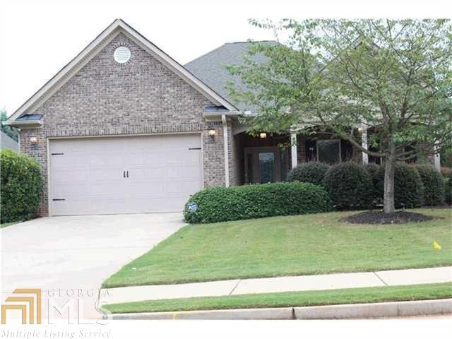 Incredible value in exclusive Estates of Cameron Manor - Custom built, well maintained Craftsman home with wide open floor plan, volume ceilings and crown moulding, dramatic great room for entertaining, kitchen with gleaming white cabinets and gorgeous granite! Luxe spa baths, elegant tilework, this home is perfect for downsizing with serene master suite, and private guest suite. Screened porch overlooks private back yard -- and wait!! Neighborhood Assn provides complete lawn service -- your buyers can relax and enjoy the good life here!