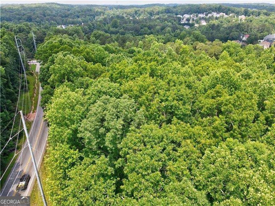 Build Your Dream Home or Subdivision!          Developers, Homebuilders, or Investors...Ready to build your dream home or a new subdivision? This beautiful private, wooded lot is 7+ acres and would make the perfect building site! Lot Sits adjacent to beautiful stately homes and established and newly built homes. Privacy is second to none, with a mixed and heavily wooded lot and great space for your peaceful escape. Close to Great schools, walking trails, State Park, and Arabia Mountain, and close to I-20. This property has a Plat and can be subdivided. Close to Stonecrest Mall, shopping, and restaurants. A great location for your new home. Utilities available.