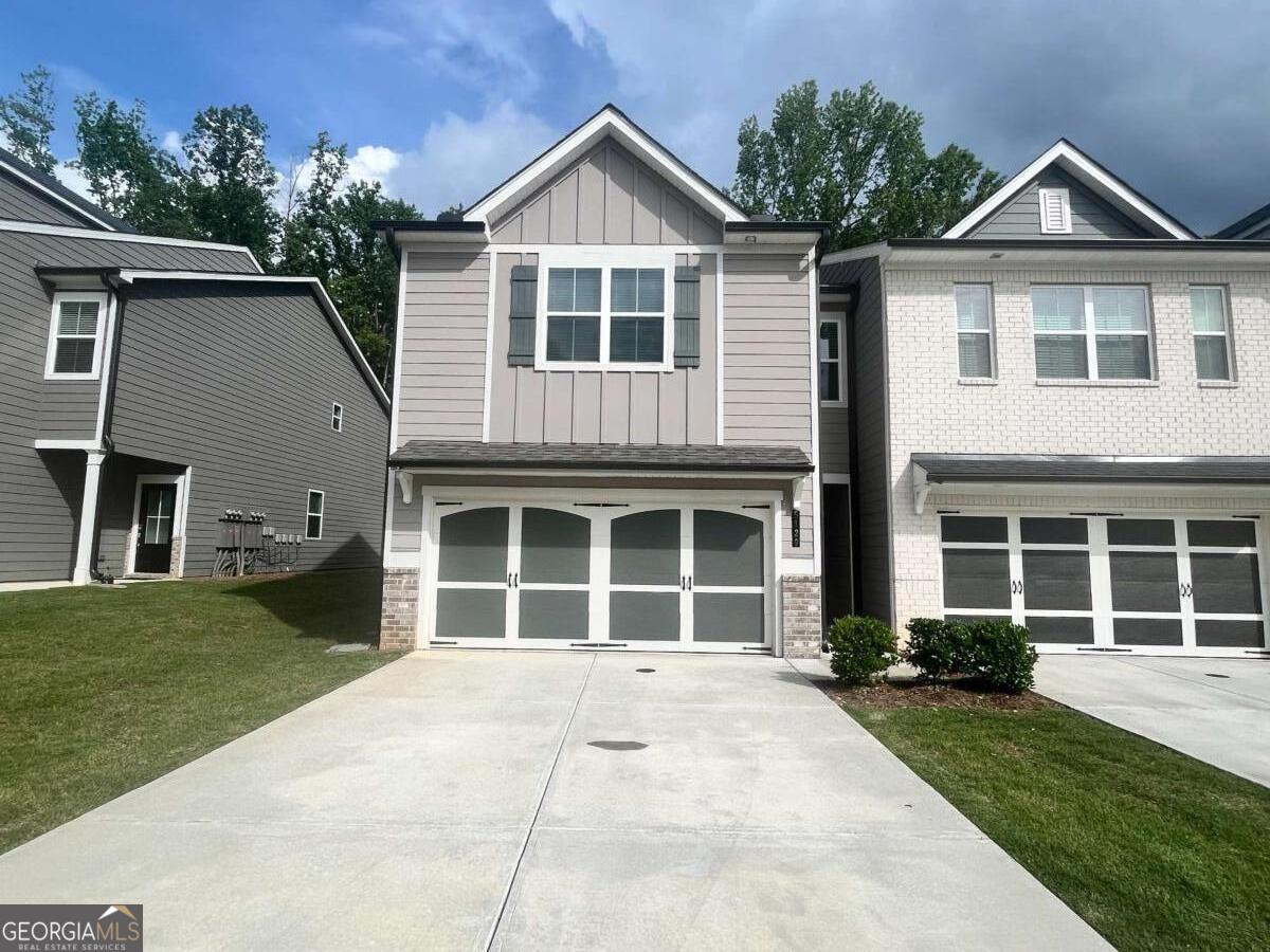 Ready to move in New Construction Townhome for Rent - Corner Lot in Flowery Branch, GA! Welcome home to this beautifully designed new construction townhome perfectly situated on a desirable corner lot in the heart of Flowery Branch! This spacious two-story home offers modern living with stylish finishes and thoughtful features throughout. Main Living Area: Step inside to an open-concept great room ideal for entertaining and everyday comfort. The space features luxury vinyl plank (LVP) flooring, a sleek Linear Fireplace, and seamless flow into the kitchen and dining areas. The kitchen is a standout with its white cabinetry, stone countertops, and a full tile backsplash. A large center island provides additional prep and seating space. Complete with electric range, built-in microwave, and dishwasher, this kitchen is as functional as it is beautiful. Upstairs, retreat to your private primary bedroom complete with a double vanity, walk-in shower, and generously sized walk-in closet. LVP and carpet throughout, Attached garage, Modern finishes, Energy-efficient construction, Privacy Fence Just minutes from local shops, dining, and entertainment, this townhome is also convenient to the Atlanta Falcons Headquarters, year-round community events, and the natural beauty of Lake Lanier-perfect for boating, swimming, and weekend getaways. This gorgeous rental won't last long. Contact us today to schedule your private tour! WE NEVER ADVERTISE ON CRAIGSLIST OR FACEBOOK MARKETPLACE.