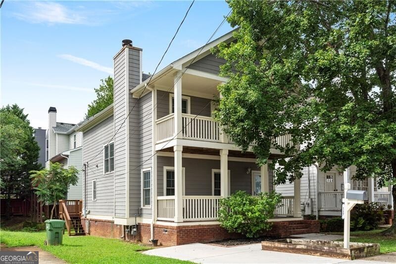 Charming newly updated home in desirable Summerhill neighborhood seconds to local shops and restaurants, new Publix Grocery store and Georgia State University campus. Kitchen with quartz island, white cabinetry, stainless steel appliances open to dining area and a living room with hardwood floors, fireplace. Full laundry room including washer/dryer plus a powder room. Primary suite with walk in closet, double quartz vanity, jacuzzi tub, shower. All 3 bedrooms are up. Fresh paint throughout. Great outdoor spaces- Large front porch on main level and upstairs off of primary plus a back deck!