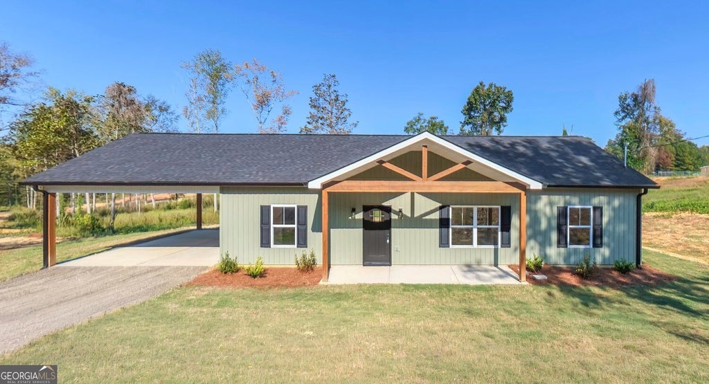 Photo of 214 Arbacoochee Road, Tallapoosa, GA 30176 (MLS # 10849707)