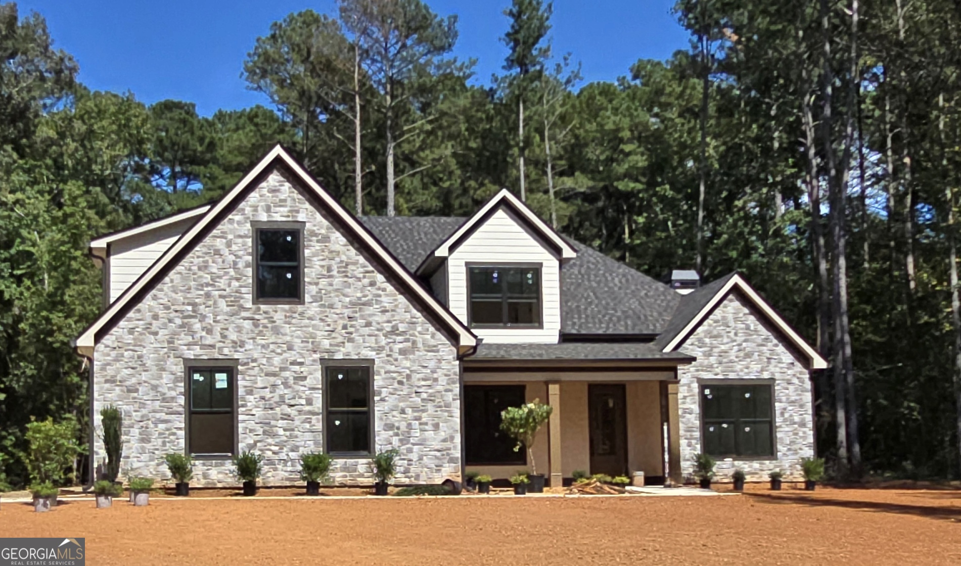 SUBMIT YOUR CONTRACT BEFORE COMPLETION FOR MORE BUYER SELECTION CHOICES FOR THIS CUSTOM NEW CONSTRUCTION on 2.56 Acres - CHOOSE YOUR FINISHES to make this 5Bedroom, 4Bath custom home perfect for you and your family. This exquisite new construction custom home offers the perfect blend of luxury, comfort and convenience with NO HOA. Thoughtfully designed for modern living and entertaining. Primary Suite on the Main Level Plus an additional Guest Suite with full bathroom. Open Concept Living with custom millwork and soaring ceilings in the great room and keeping room. gourmet kitchen, large island, covered outdoor patio, three car garage and so much more. Highly desirable Blake Bass Middle and Northgate High Schools. Easy access to I-85 and minutes from shopping, dining and entertainment.