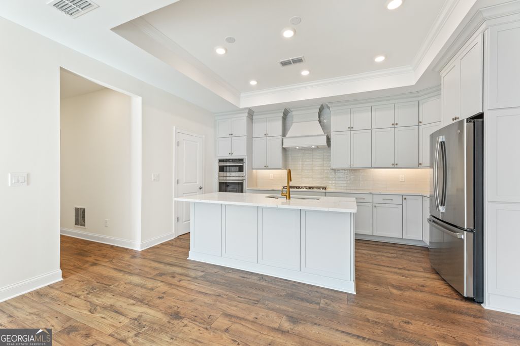 Photo of 5245 Maggie Mae Ln, Cumming, GA 30028 (MLS # 10759985)