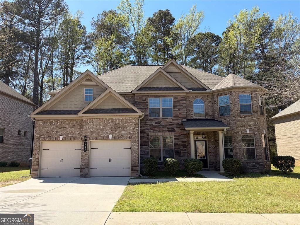 Photo of 410 Live Oak Pass, Loganville, GA 30052 (MLS # 10721782)
