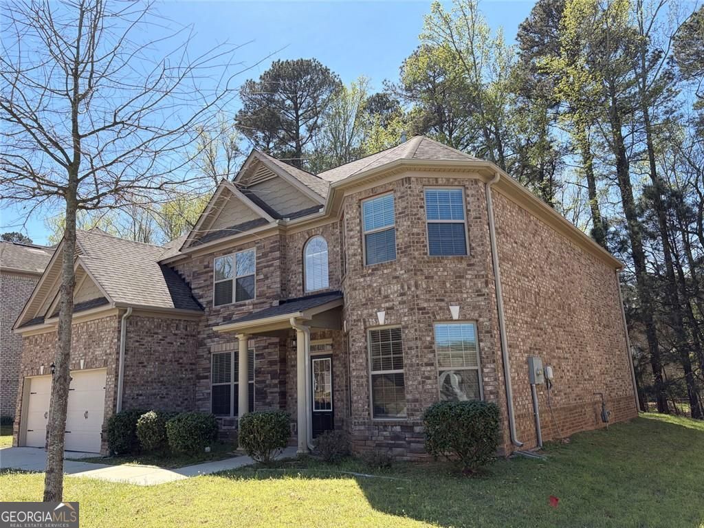 Photo of 410 Live Oak Pass, Loganville, GA 30052 (MLS # 10721782)