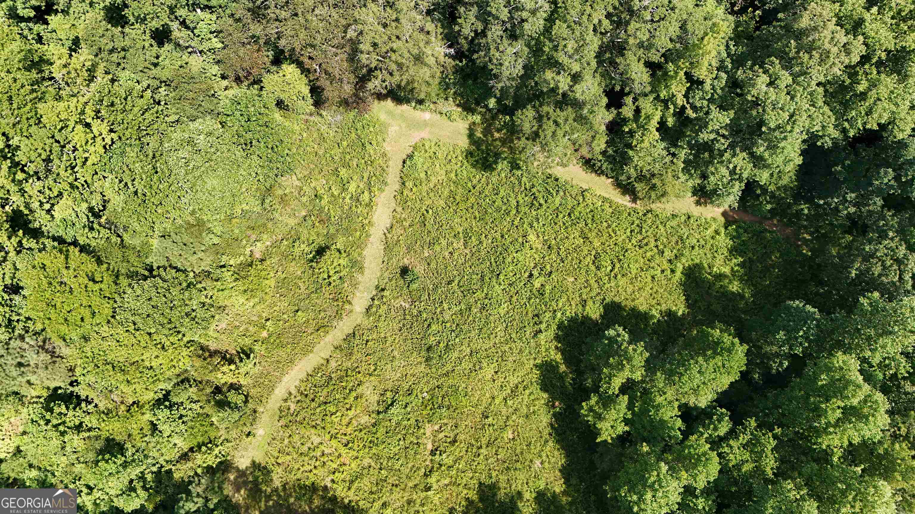 10 acres, 50 ft deeded road frontage access. Private and borders a pipeline to the back. Beautiful land and super convenient location in the highly sought after Sandhill area. Gated access requires an appointment for showings. A year round stream meanders across the property. Abundant wildlife and multiple building sites make this opportunity a win win. Don't hesitate to make an appointment to see this property, and submit your offer. Call Today!