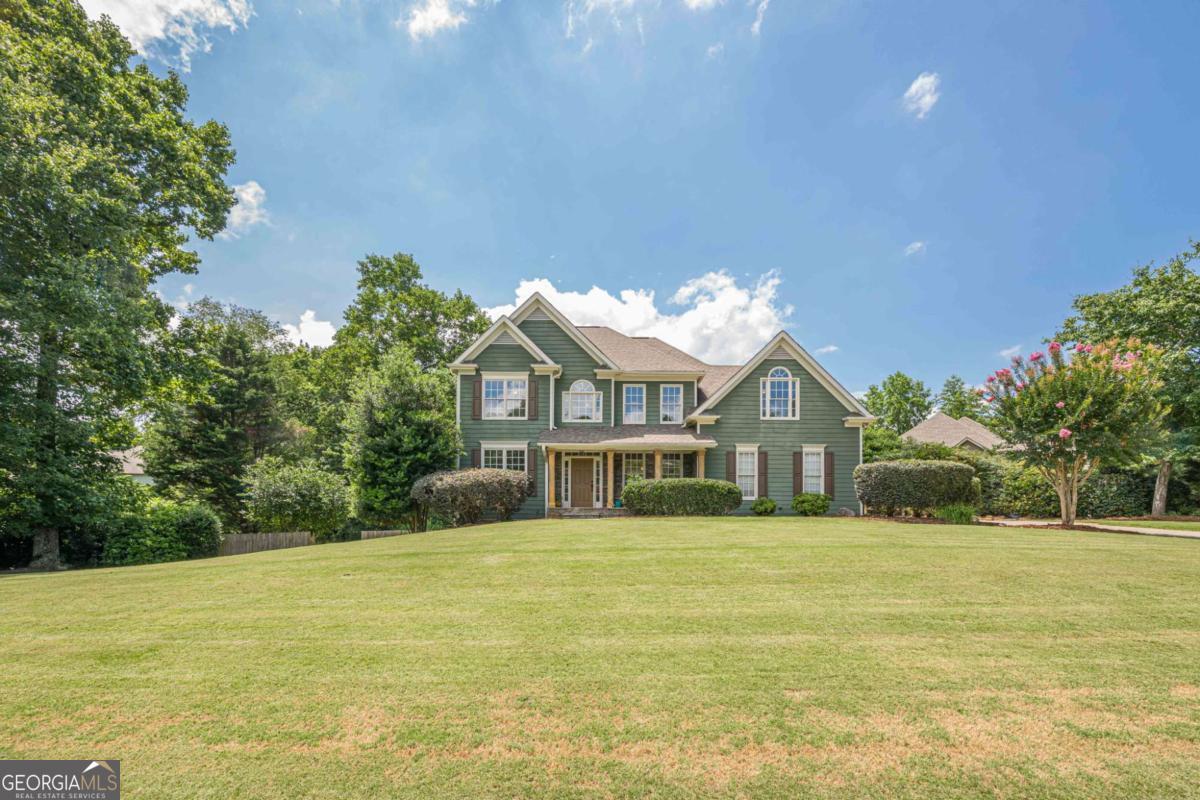 Amazing opportunity to own in highly desired Princeton Square neighborhood! Enjoy the large landscaped front yard from your rocking chair front porch, or entertain with a beautiful stone firepit and fenced in backyard! Sprawling two story foyer with formal living, dining, great room and open concept kitchen along with a half bath and laundry room on the main level. Brand new carpet upstairs with four oversized bedrooms including the massive owners suite with separate sitting area. Unfinished basement stubbed for an additional bathroom, ready to be finished to your liking. Walking distance to both elementary and middle schools and Haw creek park!