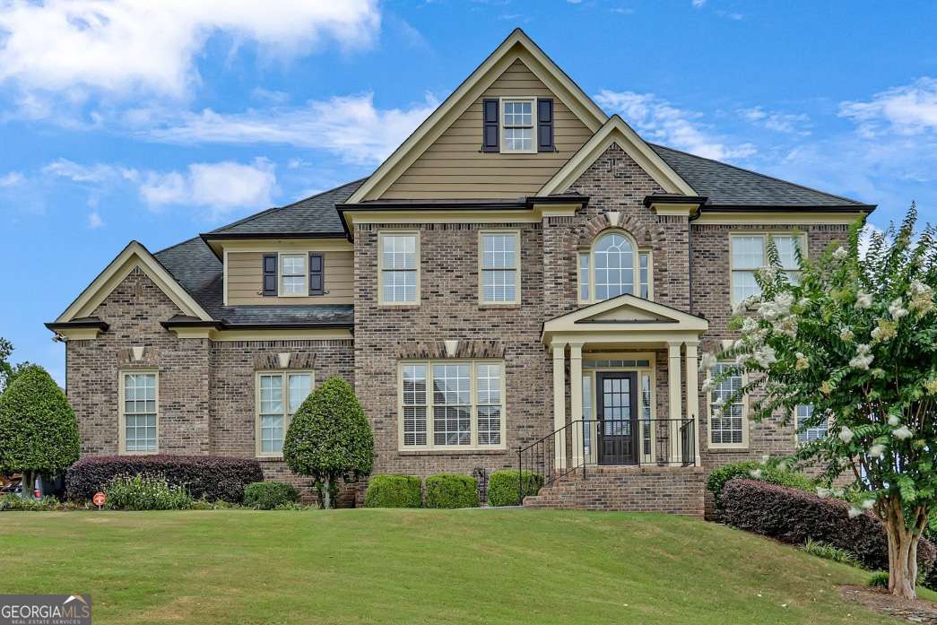 Welcome to 1205 Water Shine Way in one of Snellville's Sought after Premier Lake Communities, Bright Water! Located in award winning Brookwood School District. This beautifully maintained, home offers three spacious levels of living. Home is situated on a level landscaped lot with custom built multi-level deck in pristine condition-perfect for entertaining or peaceful outdoor enjoyment. Nestled in a sought-after neighborhood, residents enjoy top-notch amenities including a clubhouse, swimming pool, tennis courts, playground, and scenic fishing and canoeing lake. Backyard is fenced in for your fur-fam to have a healthy outdoor life. Step inside to find a gently lived home with thoughtful details. Home offers bedroom on the main with full bathroom, fabulous kitchen with big island, walk-in pantry, trash compactor, family room offers double-story foyer for a grandeur feel, formal dining has a butler pantry on the side to make entertaining easy and organized. Upgraded 2nd level offers 4 bedroom, includes Spacious Master Bedroom with a cozy sitting room and grand master bathroom. It also offers 3 additional bedrooms and 2 additional full bathrooms. Each bedroom offers its own access to the bathroom. Full exterior entry basement is stubbed for bathroom and framed, a blank canvas for what you envision. Whether you're gathering with family, hosting guests, or relaxing in your private retreat, this home offers space, comfort, and timeless quality. Additionally, new HVAC system recently replaced and sprinkler system. The community offers clubhouse, pool, multiple tennis courts, playground, serene lake for fishing and canoeing. The community oozes pride of ownership starting with well manicured entrances, beautifully kept and maintained community common areas. Amazingly landscaped yard after yard. This home & the community checks off many boxes on the list of quality, serene, and peaceful living. Don't miss your chance to own in one of Snellville's most desirable amenity-rich residential community!
