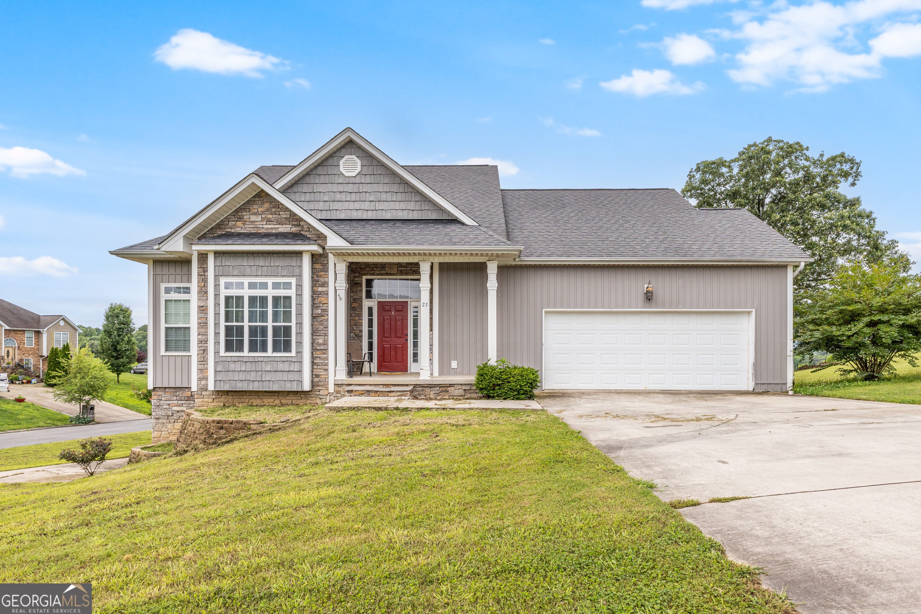 BEAUTIFUL, SPACIOUS custom home located inside the fantastic Jamestown Manor neighborhood! If you are looking for a gorgeous home with plenty of living space, don't miss this one! With over 3100 SQ FT of living space, including an upstairs and a finished basement, this 4 BD, 3.5 BA residence is the perfect fit for a growing family or even multigenerational living. Inside you will find a spacious living room with a gas log fireplace, an oversized kitchen and a formal dining room, and a large master bedroom with en-suite full bath and walk-in closet. Additional 3 bedrooms are upstairs with a jack-and-jill full bath. The basement has a huge bonus room that is currently used as a 5th bedroom and has its own full bath as well. There is a garage off of the basement as well as a 2-car garage on the main level. Lovely back porch with a great view of the mountains! Don't miss this fantastic home! Call today for your private tour!