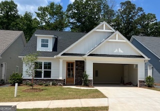 Welcome to West Georgia's newest 55+ planned-life community! Come see this gorgeous 3 bedroom, three & half bath home in The Preserve At The Birches on Maple. As soon as you walk into the Maple, you are greeted by a foyer with beautifully pre-engineered hardwood floors. Not far ahead, you will see a well-appointed kitchen with granite counters, large island & walk-in pantry overlooking the family room and private porch. The spacious primary bedroom and bathroom host a beautiful glass frameless shower with beautiful hardware. The Maple includes a two car garage and outdoor living space. Residents will enjoy a host of amenities at The Birches Clubhouse including an indoor and outdoor pool, fitness room, group fitness room, pickleball court and community garden all hosted by our very own activities director here to help facilitate your health and wellness at The Birches on Maple.
