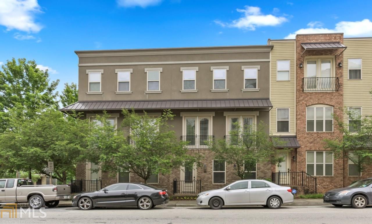 Beautiful three-story in the heart of desirable Midtown and Atlantic Station offering tons of opportunities for groceries, restaurants, entertainment, shopping, plenty of open spaces, and spectacular city views. The gorgeous gourmet kitchen is open to the family room with gas log fireplace, and features a large island for entertaining, stainless steel appliances including vent hood, granite counter-tops, tile back splash, and pantry. The huge master suite is highlighted by dual vanities, soaking tub, separate shower, granite counter-top, and tile flooring. The second upper level bedroom also has dual vanities with granite counter-top. Upper level laundry with washer and dryer provides convenience. Walk out from the separate dining room to the balcony which promises chill-laxing time on the swing and cool breeze from the outdoor fan. Hardwood floors throughout. So near to so much that offers what you want and need!