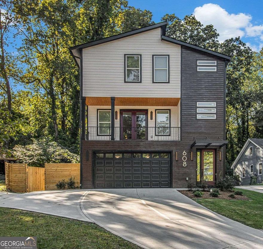 SEXY, MODERN, 3-STORY NEW CONSTRUCTION! Entering the 24-FOOT FOYER with gorgeous chandelier, this home features soaring 9-FOOT CEILINGS on all 3 floors and STATELY 8-FOOT INTERIOR DOORS and 6-FOOT WINDOWS. OPEN CONCEPT floor plan welcomes you to an air of grand opulence. A cozy fireplace & statement wall complete the family area. This showcase home on a level, fenced lot. Enjoy the Chef's kitchen surrounded by new, white, glass-front Shaker-style cabinets, island with breakfast bar, waterfall granite countertops, subway-tile backsplash, and new, high-end 4-piece stainless steel appliance package including a French door fridge, drawer microwave, and double drawer dishwasher. Relax in your oversized primary bedroom retreat featuring a walk-in closet with custom shelving system and an impressive en suite bathroom showcasing a spa resort-style wet room, with a soaking tub and oversized marble-tiled shower with dual rain showerheads. The luxurious shower panel system has a temperature display, adjustable massage jets, a LED rainfall shower head and handheld sprayer.  The driveway with dual access and 2 car garage with opener allow for ample room for friends, family & guests. Underground utilities also provide peace of mind during storms. In HOT Grove Park and the Bellwood Quarry development, access to parks abounds. Center Hill Park and its playground, a water feature playground area, are 2 minutes away! Close to everything Atlanta has to offer! HOT APPRECIATING GROVE PARK AREA! INSTANT EQUITY! PRICED $67,300 BELOW ATTACHED $615,000 APPRAISAL! $7,500 TOWARDS BUYER RATE BUY-DOWN.