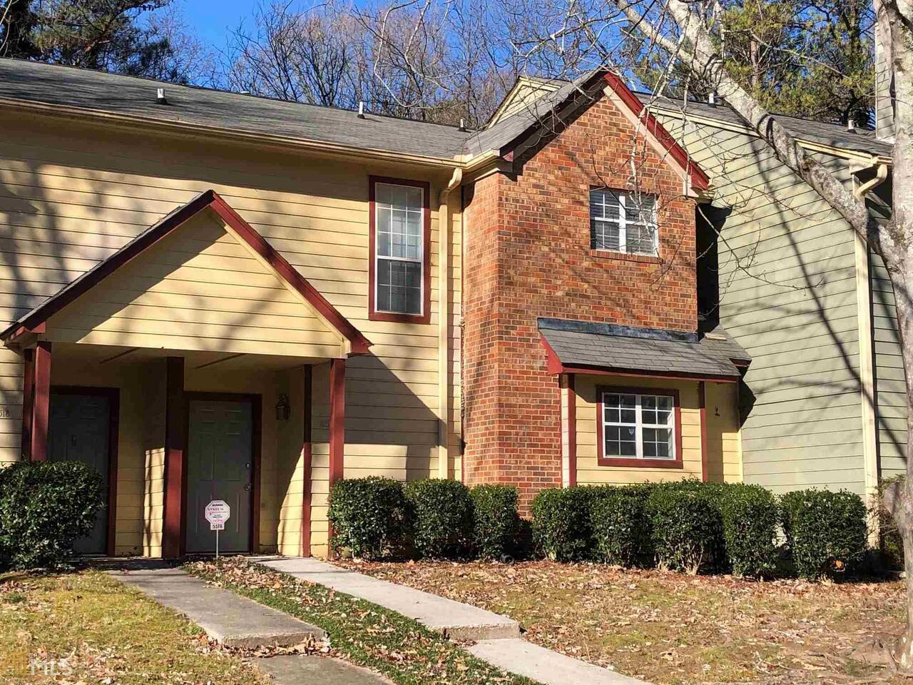 WELCOME HOME! Must see this room mate plan with 2 oversized bedrooms and spacious bathrooms. Separate dining room overlooks large sunken living room with fireplace. large kitchen with stainless steel appliances.