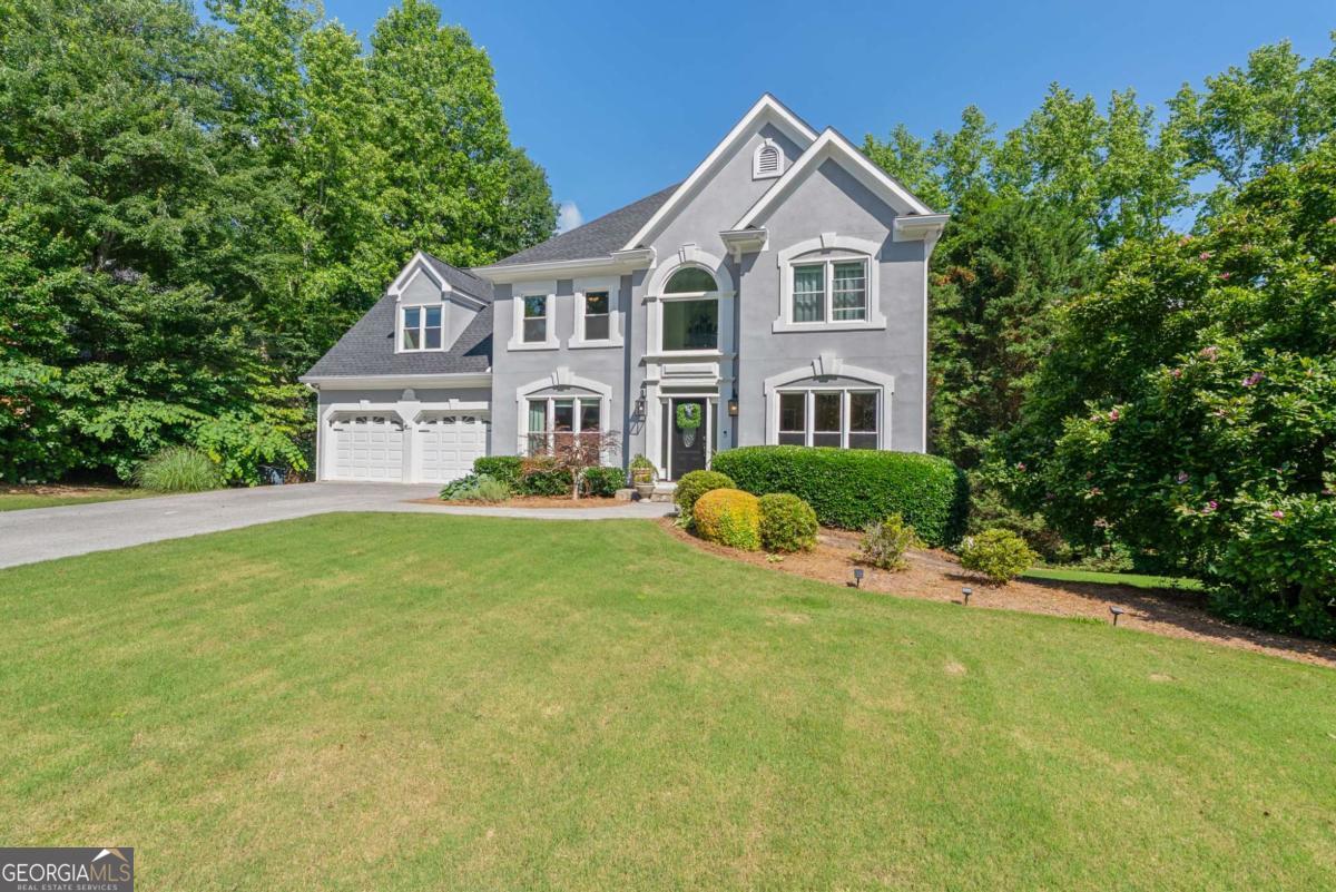 Experience Refined Country Club Living in This Exceptional Upgraded Home Welcome to the epitome of luxury and comfort in one of the area's most prestigious country club communities. This impeccably maintained residence showcases over $185,000 in premium upgrades, ensuring a move-in-ready lifestyle with no detail overlooked. From the moment you arrive, you'll be captivated by the home's outstanding curb appeal, featuring a freshly painted back deck, pristine landscaping, and a private backyard oasis complete with a fire-pit sitting area-perfect for relaxing or entertaining under the stars. Step through the front door into a bright and welcoming two-story foyer, where natural light pours into the expansive, open-concept living spaces. The main level features a versatile guest suite ideal for visitors or multi-generational living, along with a beautifully updated chef's kitchen outfitted with granite countertops, a large walk-in pantry, and seamless views into the spacious living room and eat-in dining area-tailor-made for effortless hosting and everyday enjoyment. You'll also find a generous formal dining room, an inviting living area with upgraded finishes, and a convenient laundry room with a utility sink. Every space has been designed with functionality and style in mind. Downstairs, the professionally finished basement offers endless flexibility-create a cozy media room, game space, additional bedroom, or a private home office. With multiple recreation areas and plenty of storage, this level adds substantial value and livability. Upstairs, four well-appointed bedrooms await, all featuring upgraded flooring, including a serene primary suite complete with a fully renovated, spa-like bathroom retreat. Whether you're starting your day or winding down, this space is your sanctuary. Step outside to a massive back deck, ideal for grilling, outdoor dining, or soaking in the hot tub while enjoying the serenity of your private yard. Residents enjoy exclusive access to unmatched community amenities including golf, pools, tennis courts, a baseball diamond, basketball court, amphitheater, sports fields, a clubhouse, and an on-site restaurant. With top-rated schools nearby and convenient access to shopping, dining, the YMCA, public library, and medical offices, this home offers the perfect balance of luxury, location, and lifestyle. With its extensive upgrades, thoughtful layout, and resort-style amenities, this property presents a rare and remarkable opportunity. Don't miss your chance to make it yours-schedule a private tour today and discover the best of country club living.