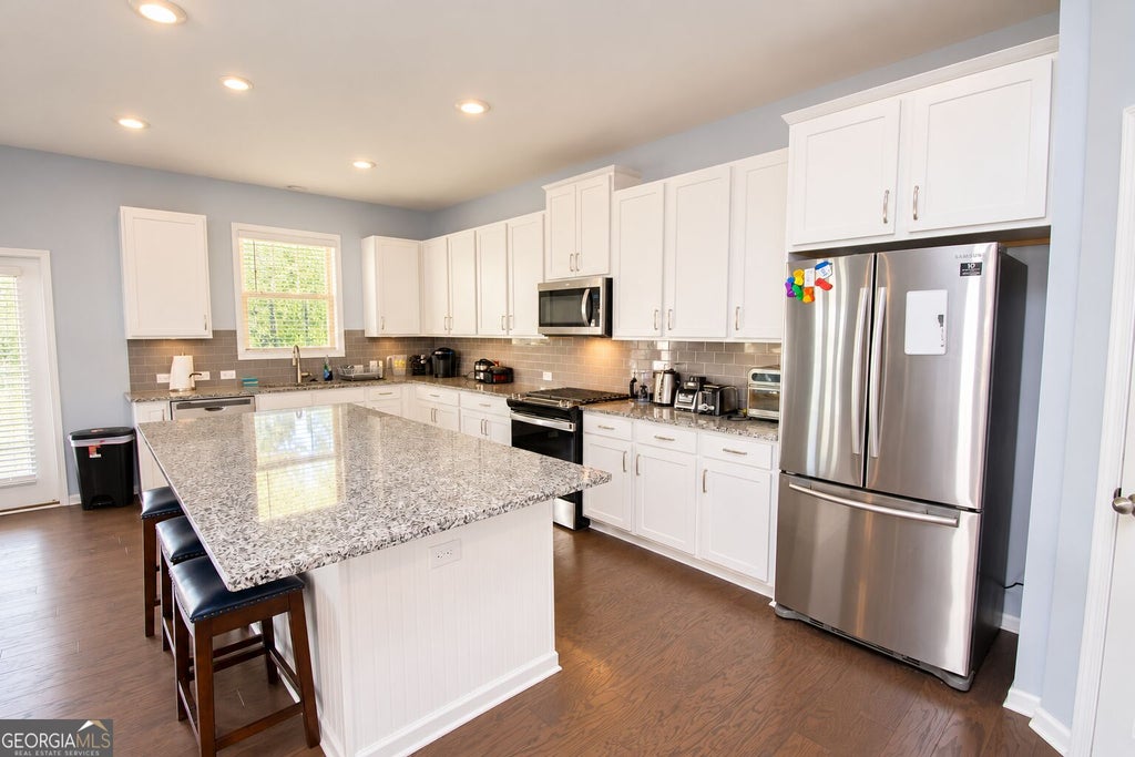 Photo of 2274 Woodmarsh Circle, Auburn, GA 30011 (MLS # 10854295)