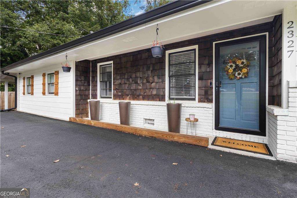 Photo of 2327 Young Road, Stone Mountain, GA 30088 (MLS # 10685238)