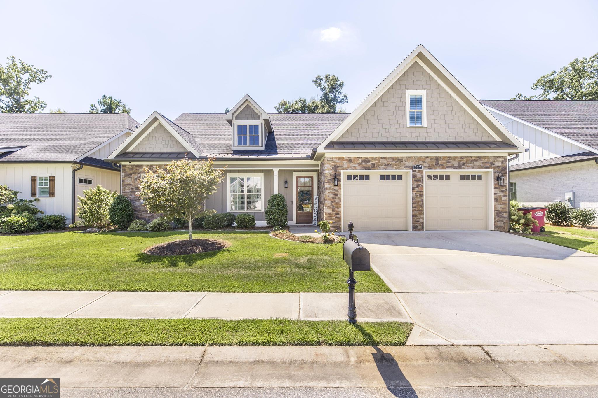 Gorgeous Home in the Prestigious '' Villas at Rivoli'' Gated Subdivision. Welcome to this stunning residence where luxury meets comfort. Upon entrance, you are greeted with a bright and open floor plan, perfect for both everyday living and entertaining. The main level features a chef's gourmet kitchen with a spacious island, custom cabinetry, farmhouse sink, and walk-in pantry, while the owner's suite boasts a designer closet, spa-inspired walk-in shower, double vanities, and granite countertops, and custom cabinetry. Two additional bedrooms each include, their own granite vanity and share a stylish Jack and Jill bath. Upstairs, a versatile bonus room can serve as a home office, media room, or guest suite, complete with a full bath and closet, and an expansive walk-in attic with high ceilings provide exceptional storage or potential for future expansion. Outside, enjoy your private backyard oasis with a screened-in porch and paver patio, all enclosed by a privacy fence. This home combines timeless craftmanship with modern amenities in one of the most sough-after gated communities-don't miss your chance to make Villas at Rivoli your new address!
